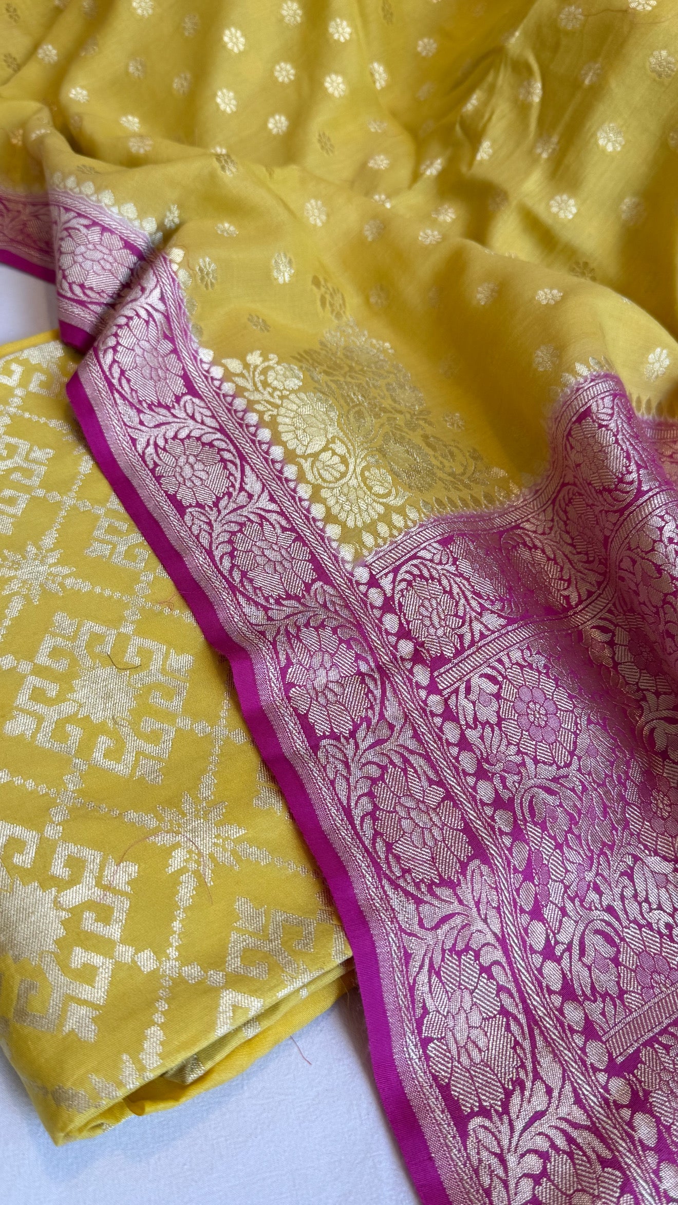 Banarasi haldi yellow - Rani pink chiniya silk kurta paired with moonga silk duppata set