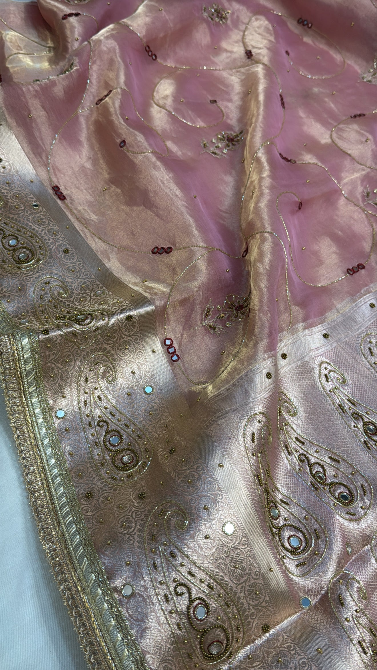 Blush pink tissue silk hand embroidered kadhwa saree