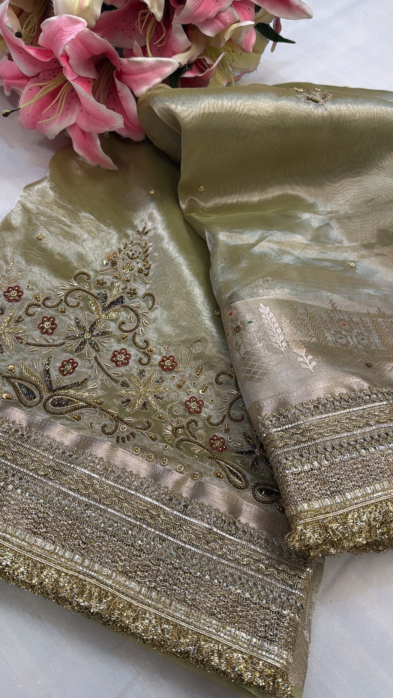 Shiny green tissue silk hand embroidered zardozi work kadhwa saree