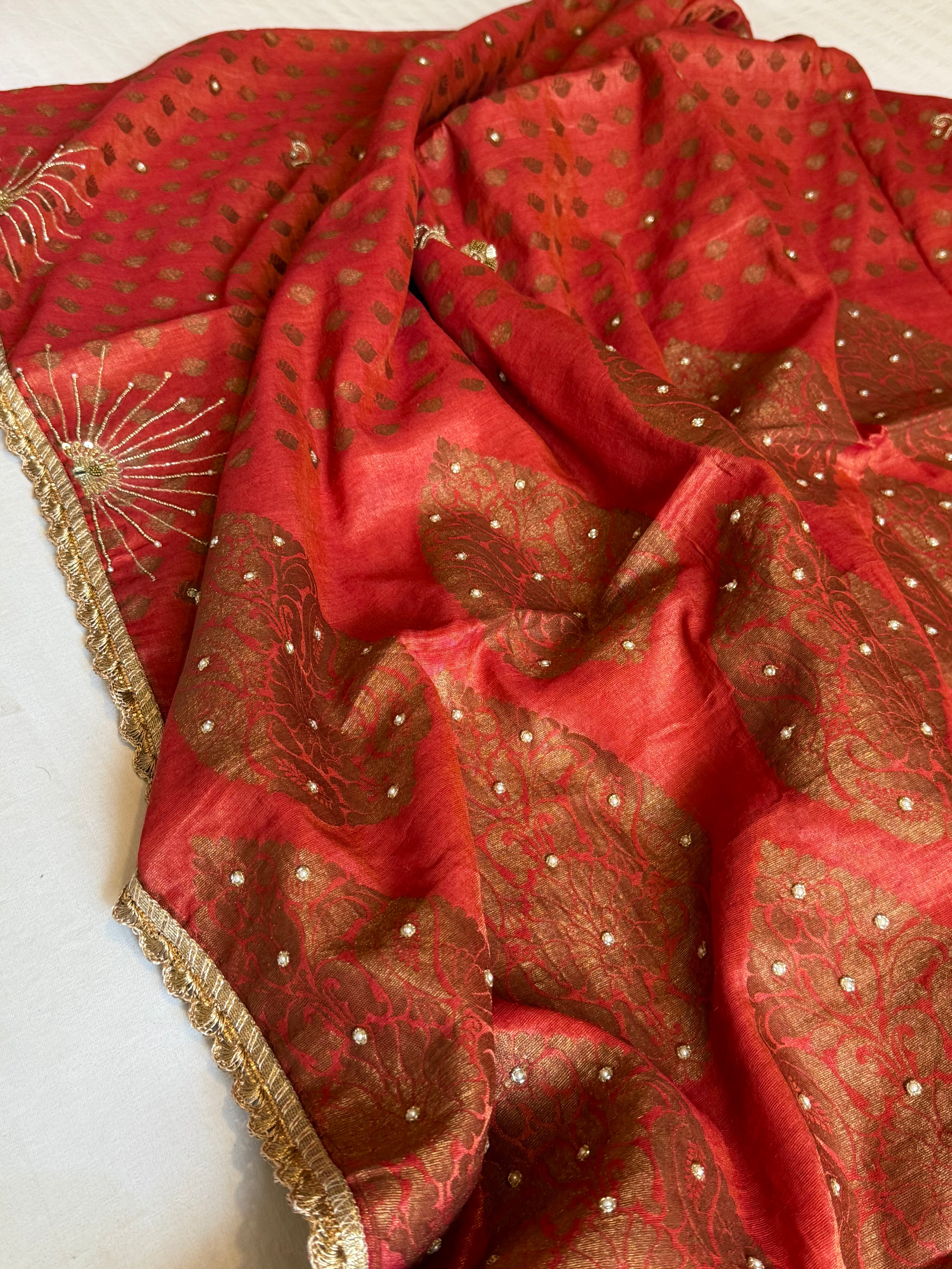 Chilly red tissue gorgette kadhwa antique zari hand embroidered saree