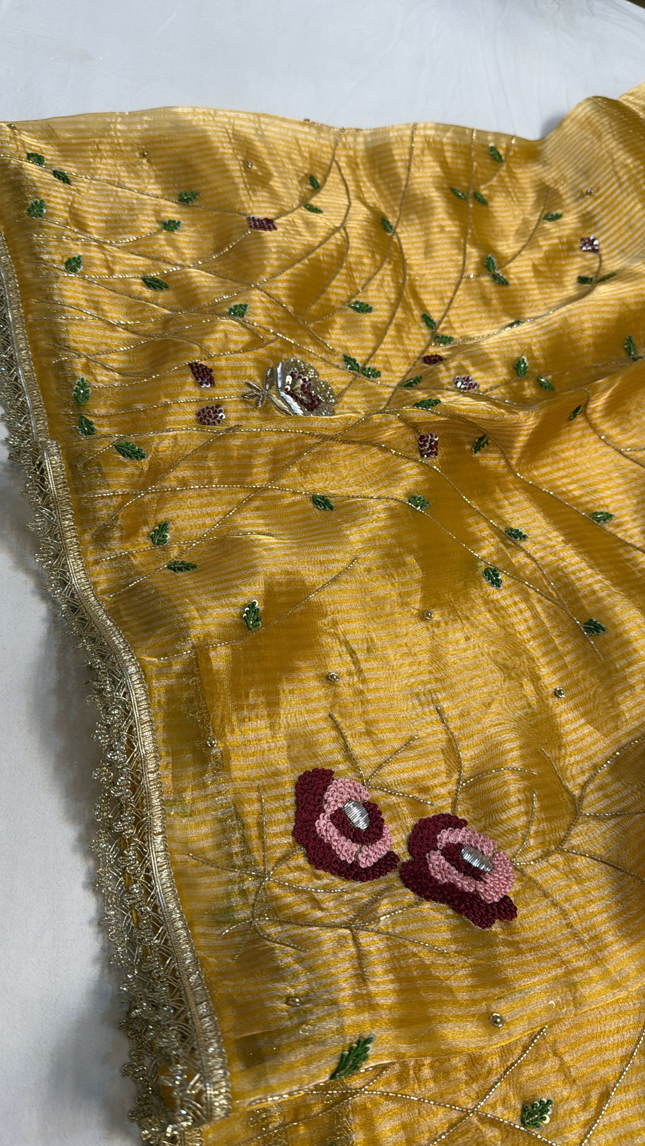 Maharani turmeric yellow tissue silk heavy meenakari hand embroidered saree