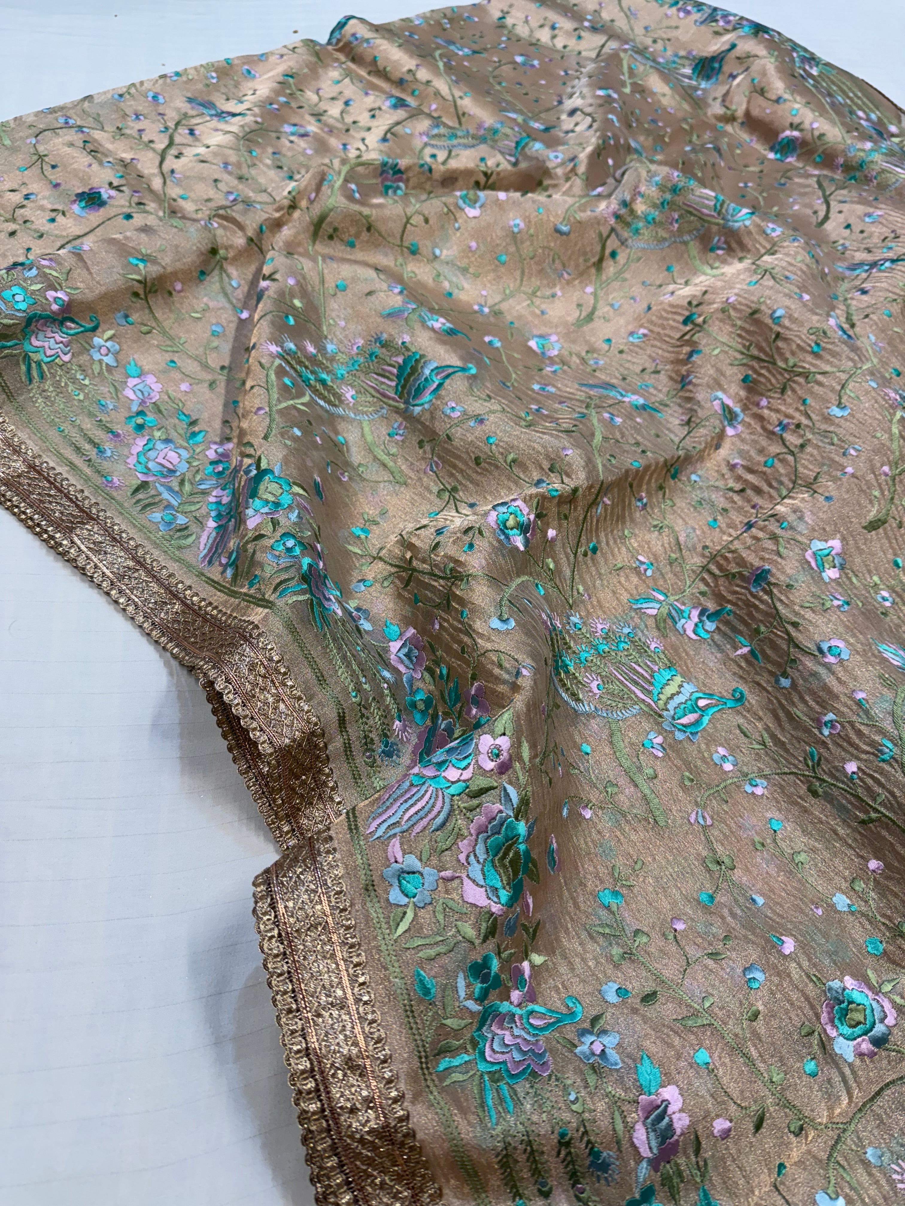 “Parsi gara” inspired tissue silk heavy resham work hand embroidered saree