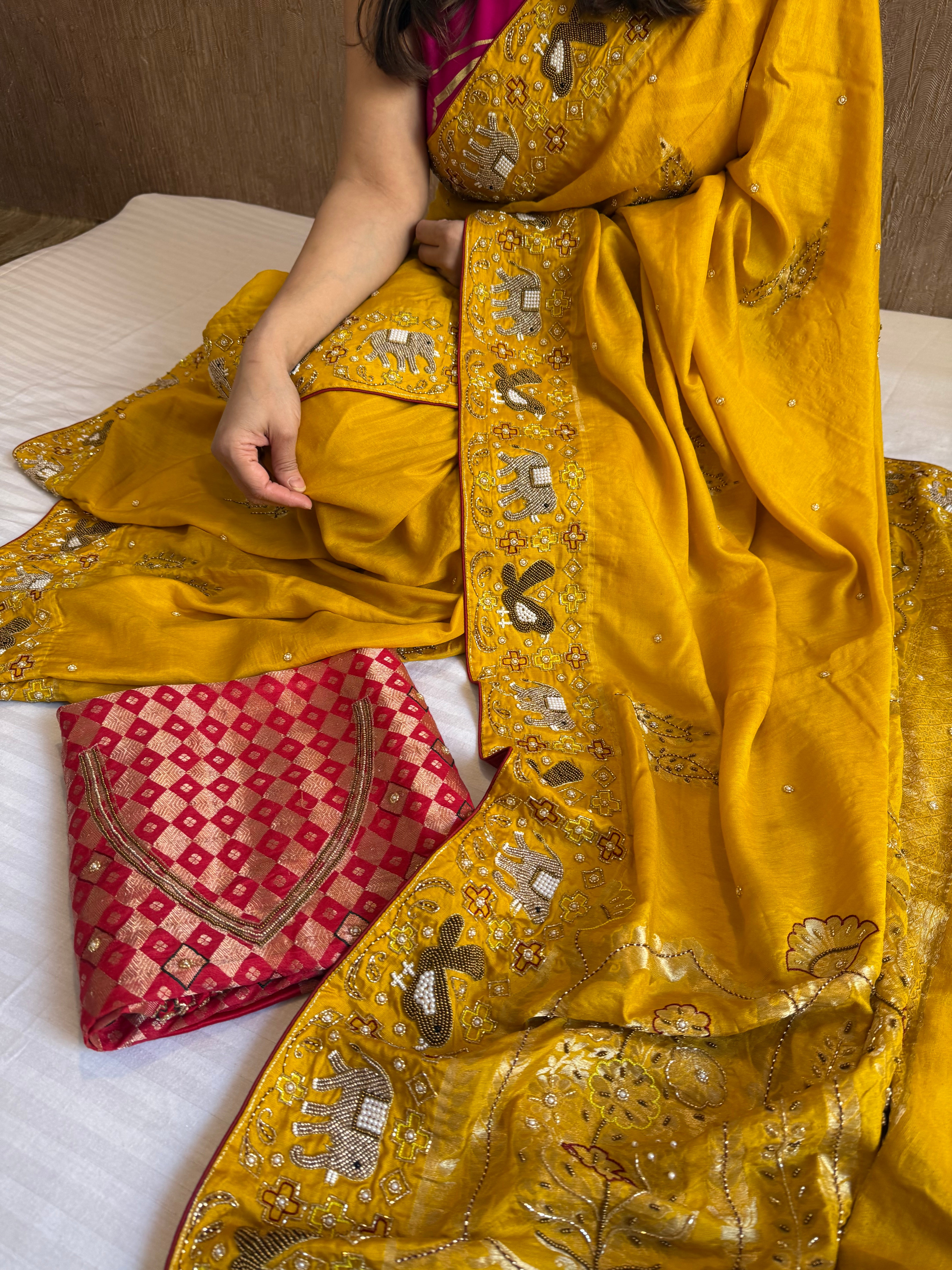 Moonga silk ikkat patola inspired hand embroidered kadhwa saree