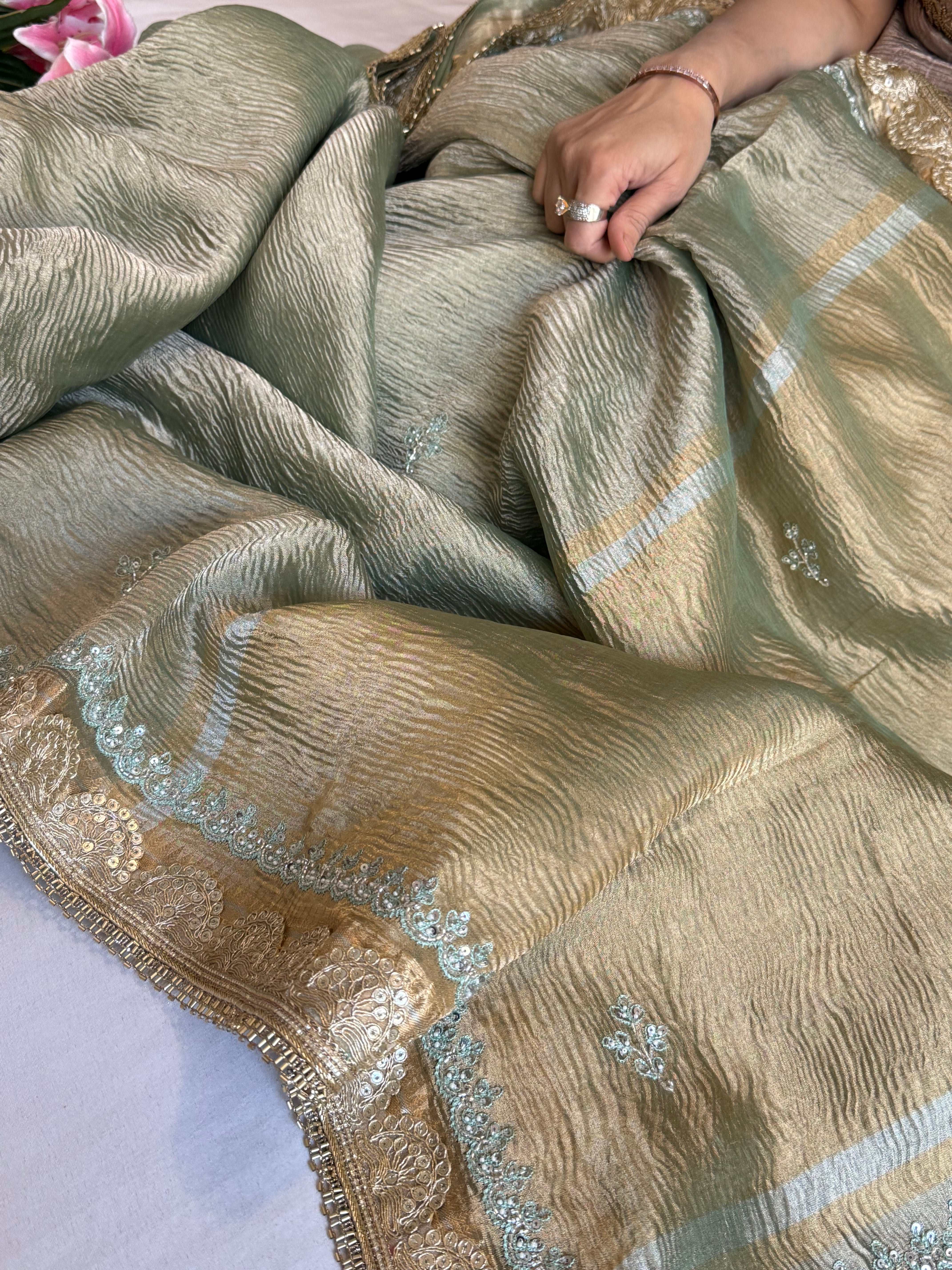 Sage green pearl work hand embroidered husn crushed tissue saree