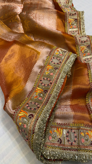 Fanta orange maharani tissue silk meenakari border saree