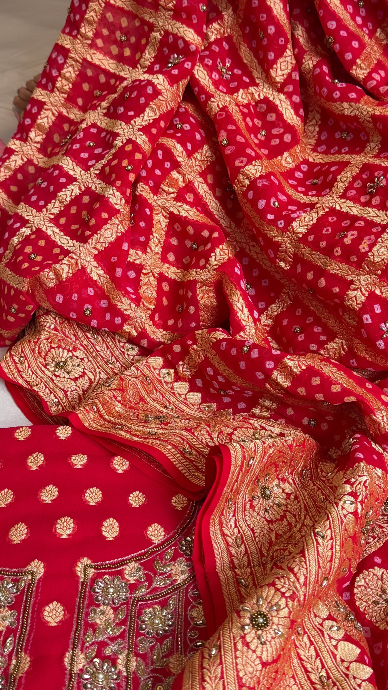 Red rai bandhej kadhwa gorgette hand embroidered suit set