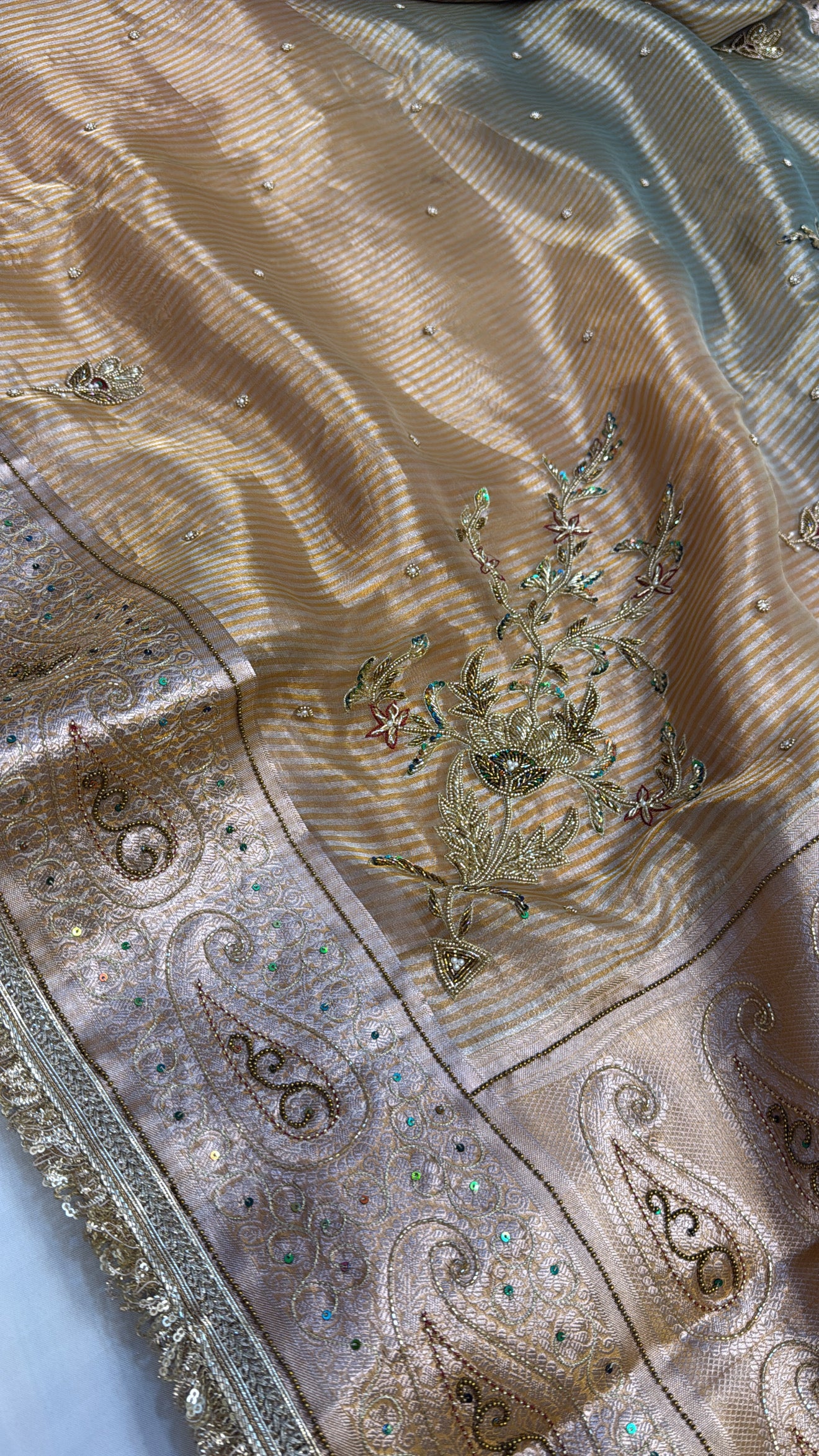 Beige-blue ombre shaded tissue silk hand embroidered saree