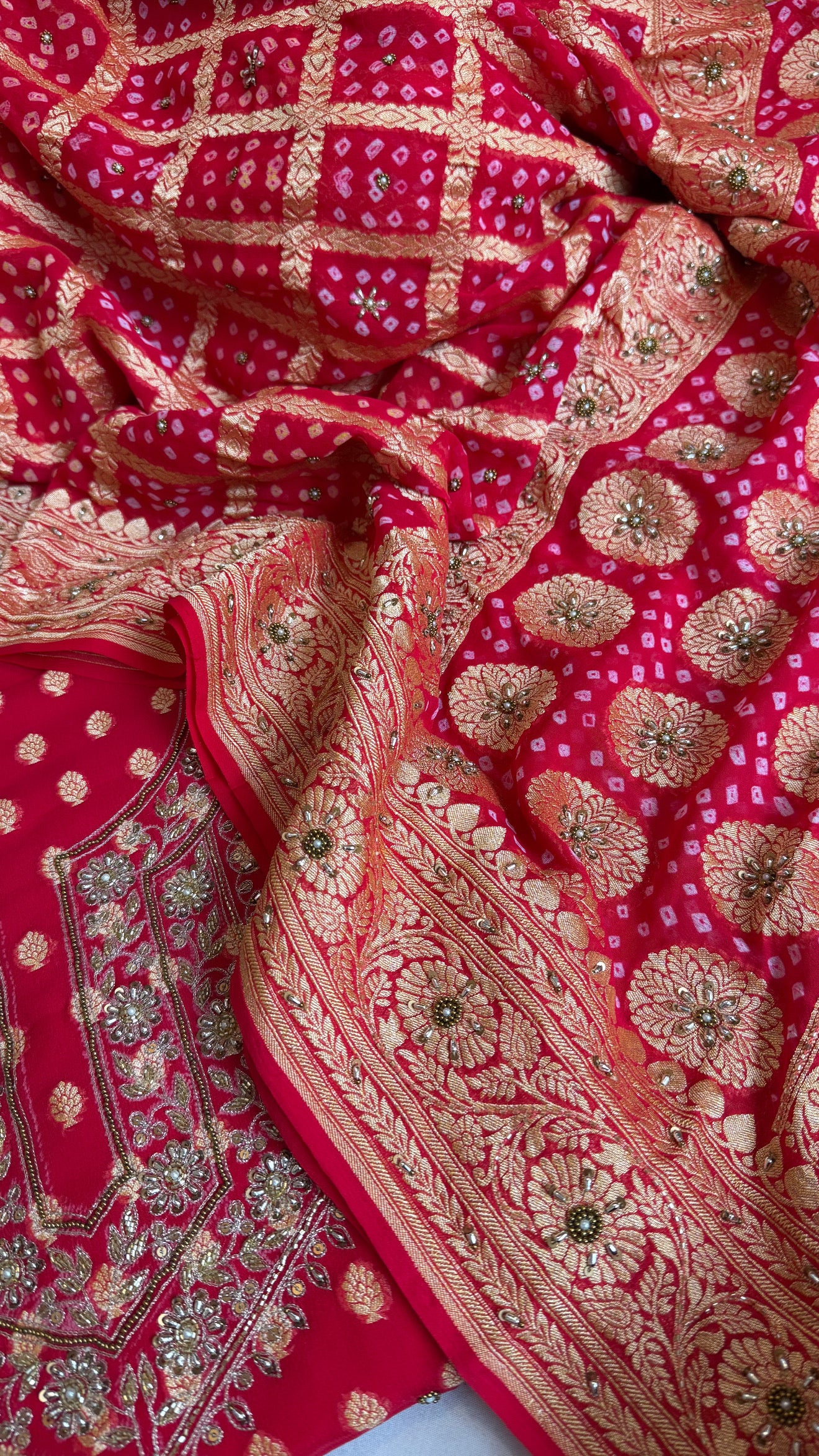 Red rai bandhej kadhwa gorgette hand embroidered suit set