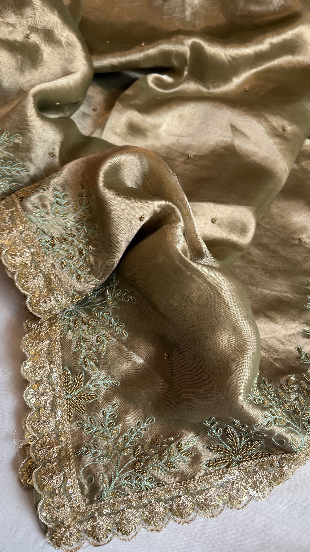 Husn tissue silk sage green heavy zardozi hand embroidered saree