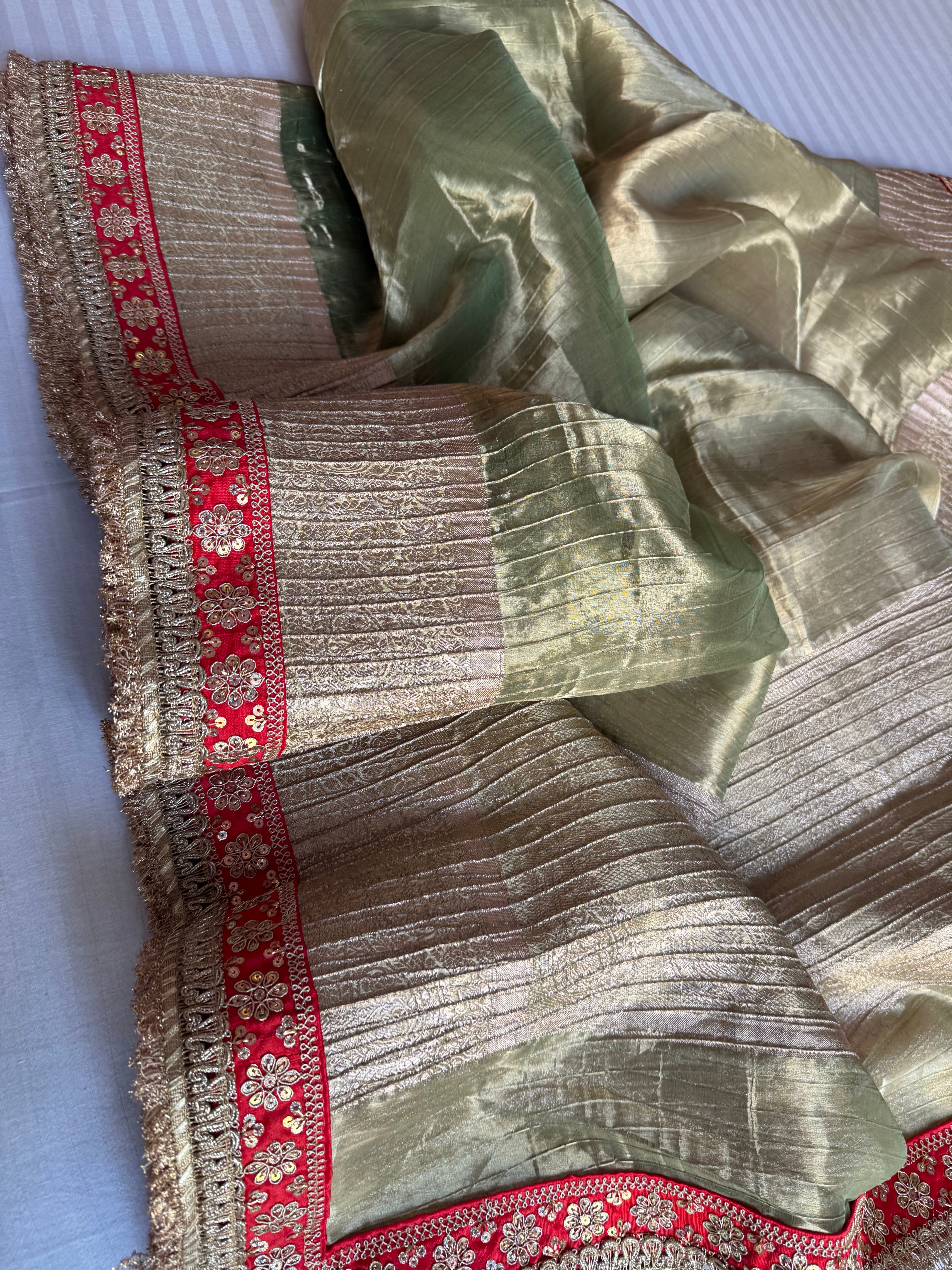 Mint green pleated maharani tissue silk kadhwa saree