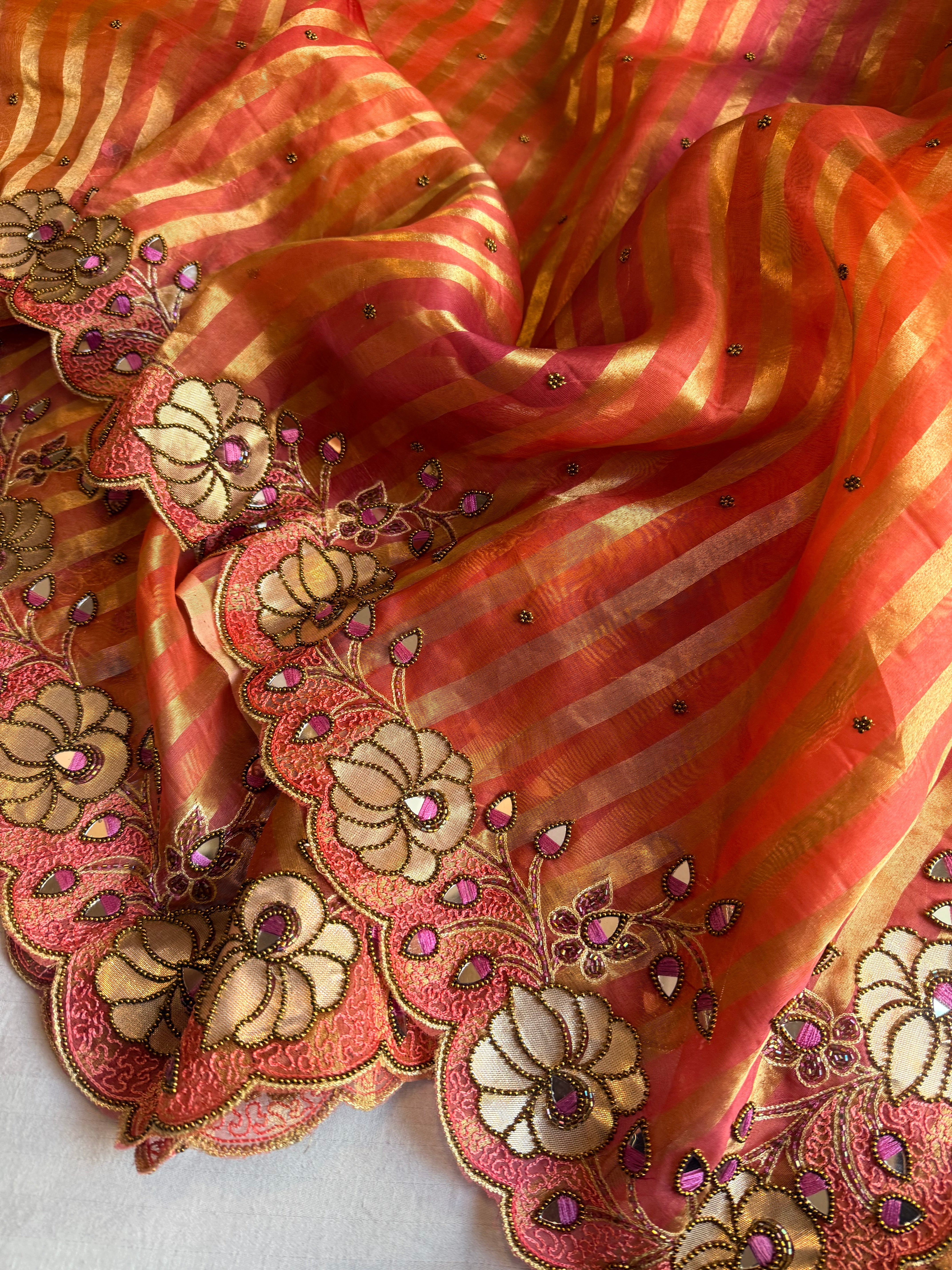 Phool wali rangeen tissue silk striped rangkaat hand embroidered saree