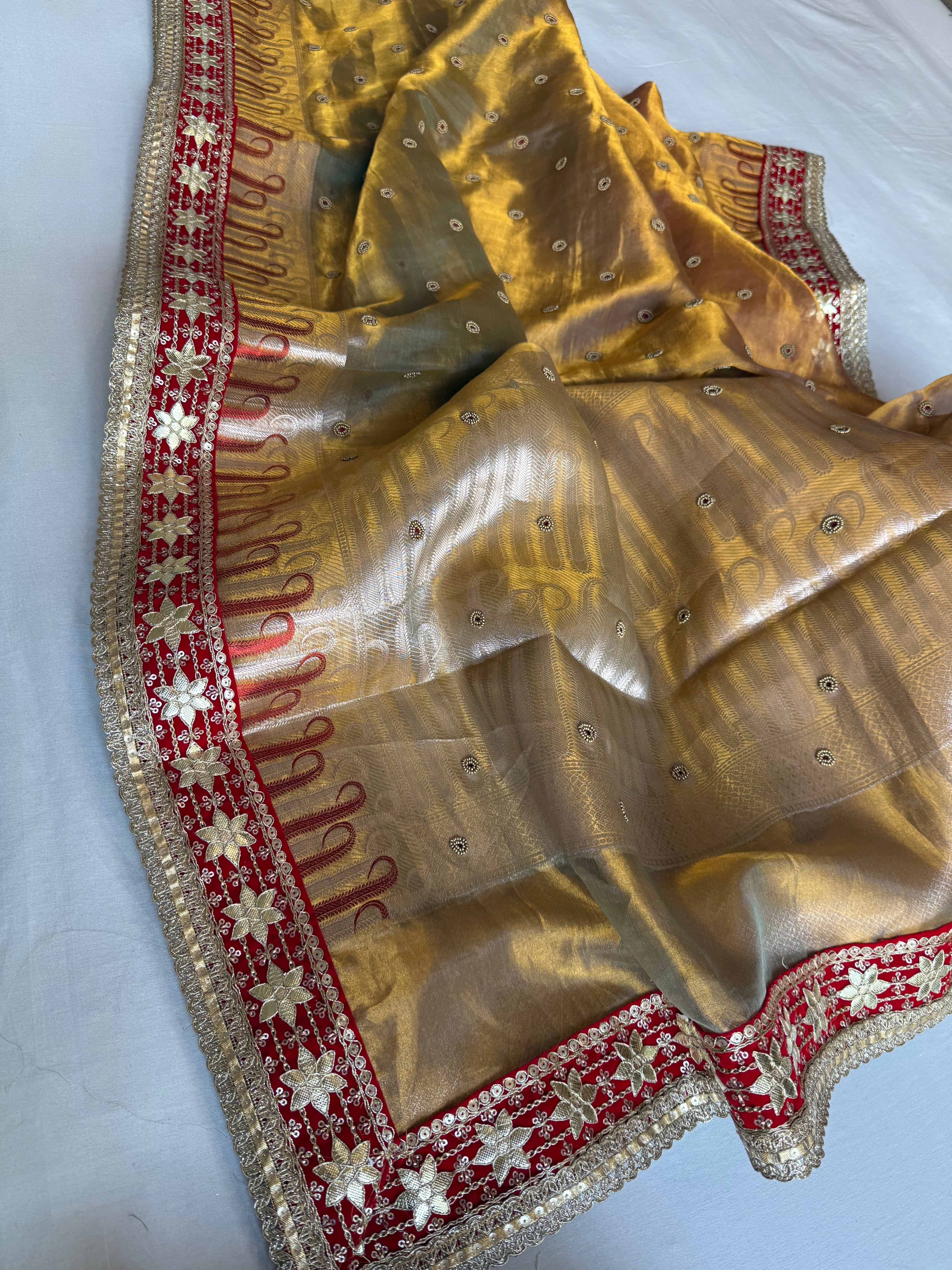 Kanjivaram gold tissue silk red meenakari hand embroidered kadhwa saree