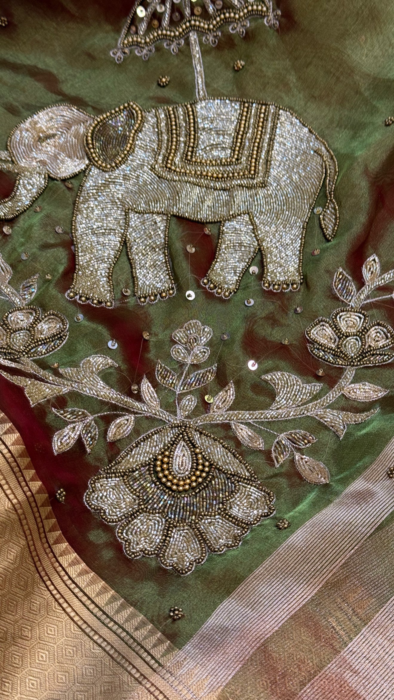 Dulhan ki maa wali sarees - Mehendi green elephant motif hand embroidered tissue saree