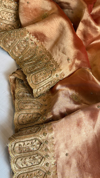 Husn reddish orange tissue silk heavy hand embroidered saree