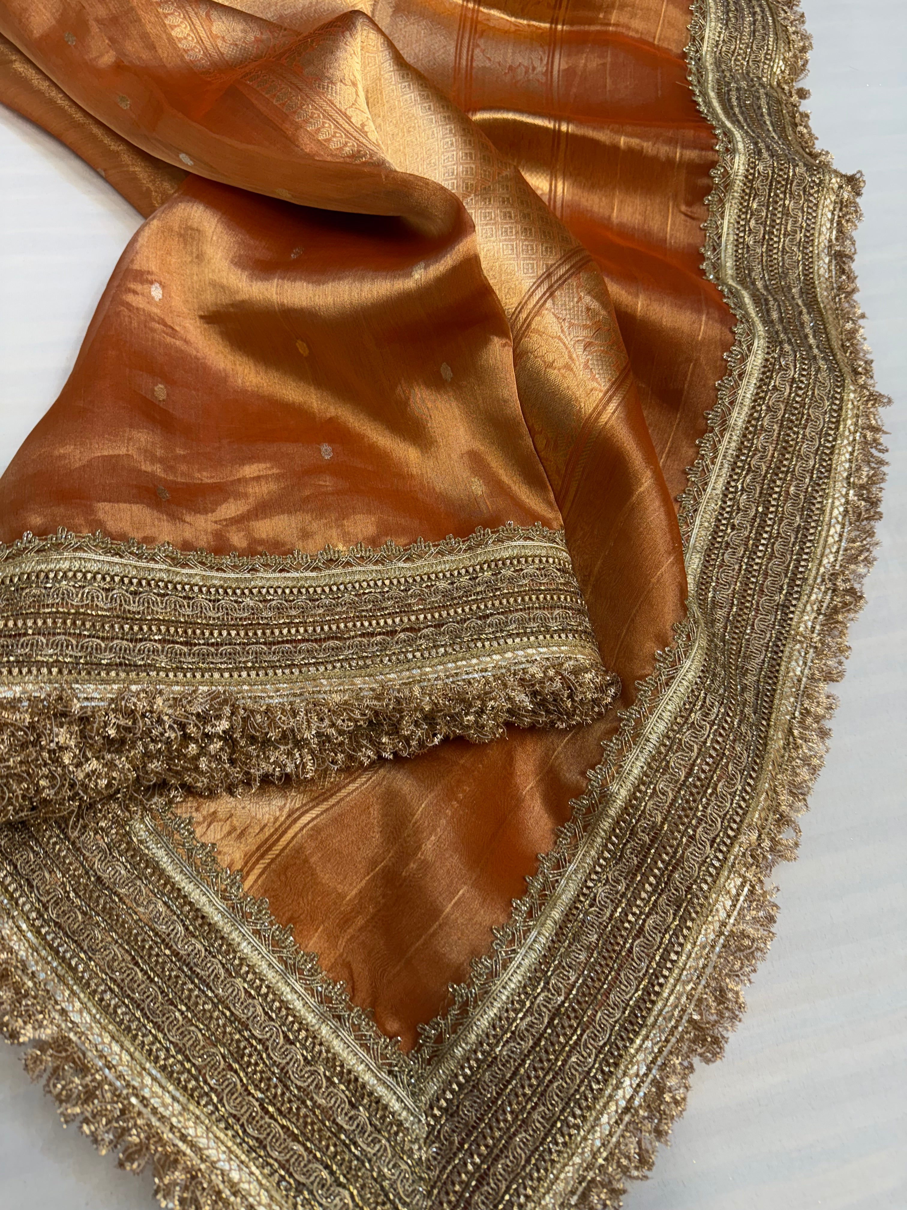 Fanta orange maharani tissue silk kadhwa buti saree