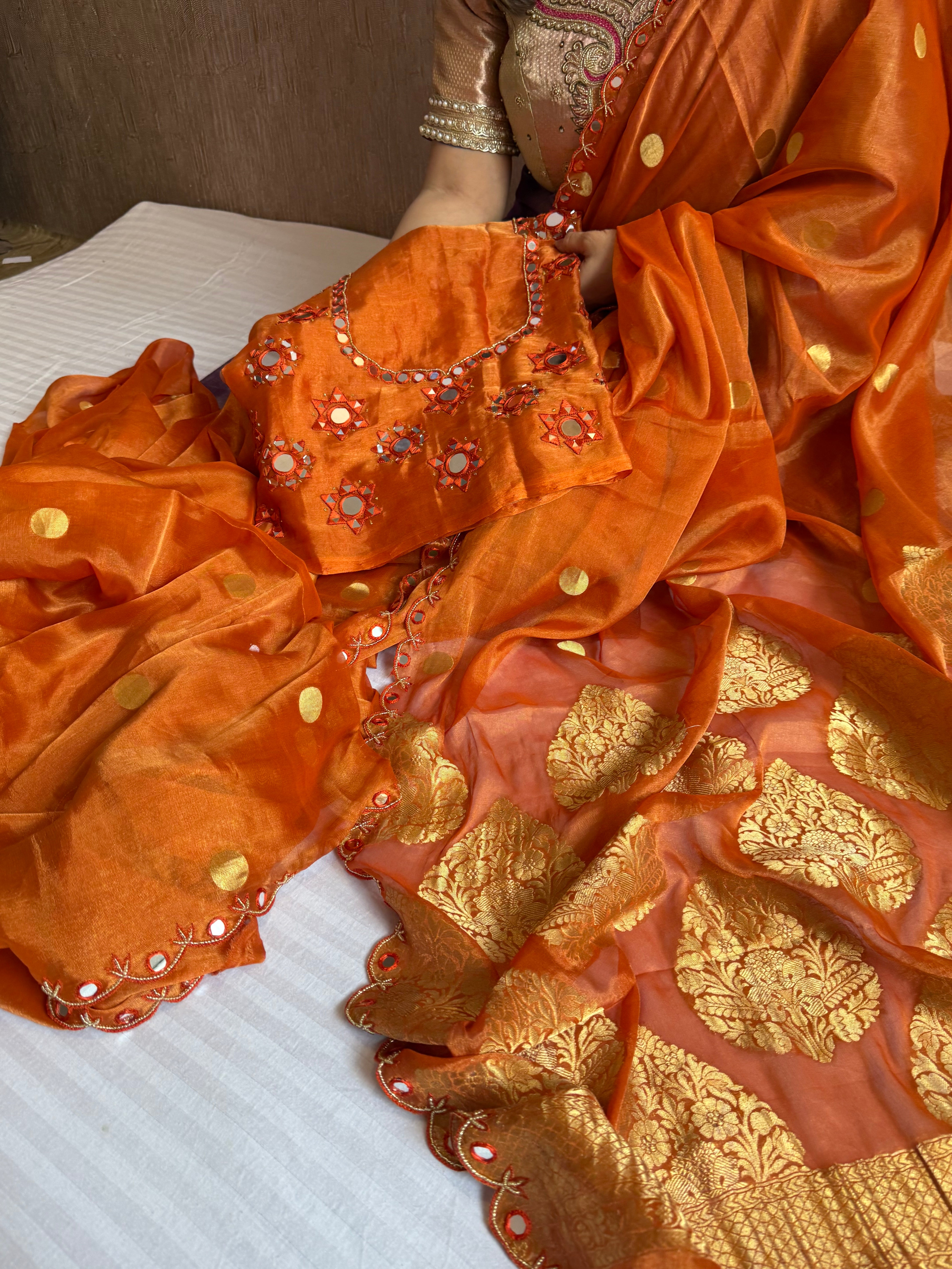 Fanta orange tissue gorgette kadhwa mirror work hand embroidered saree
