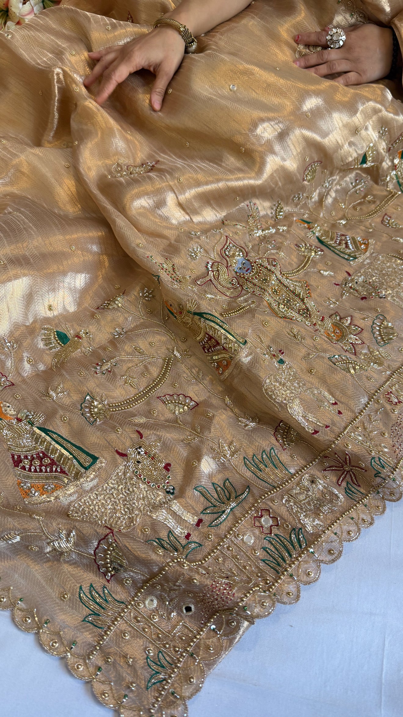 Shrinathji motif inspired molten tissue brocade kadhwa weaving hand embroidered saree