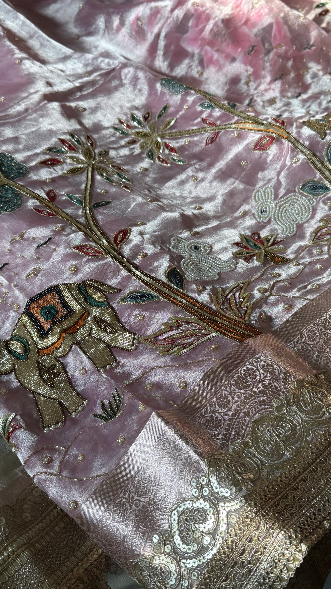 First meeting wali saree - Blush pink elephant and jungle motif hand embroidered tissue silk saree