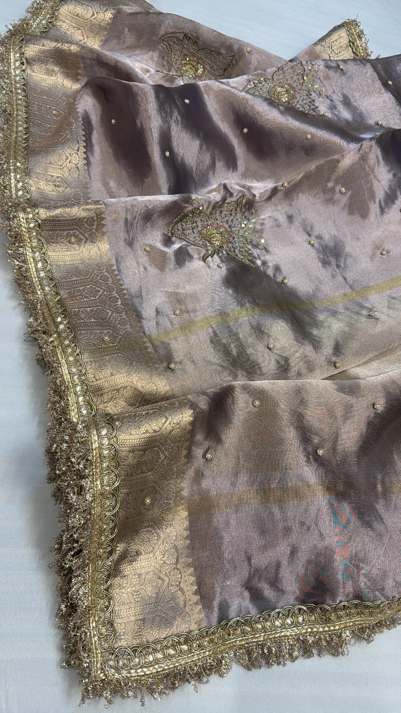 Husn ice silver tissue silk hand embroidered saree