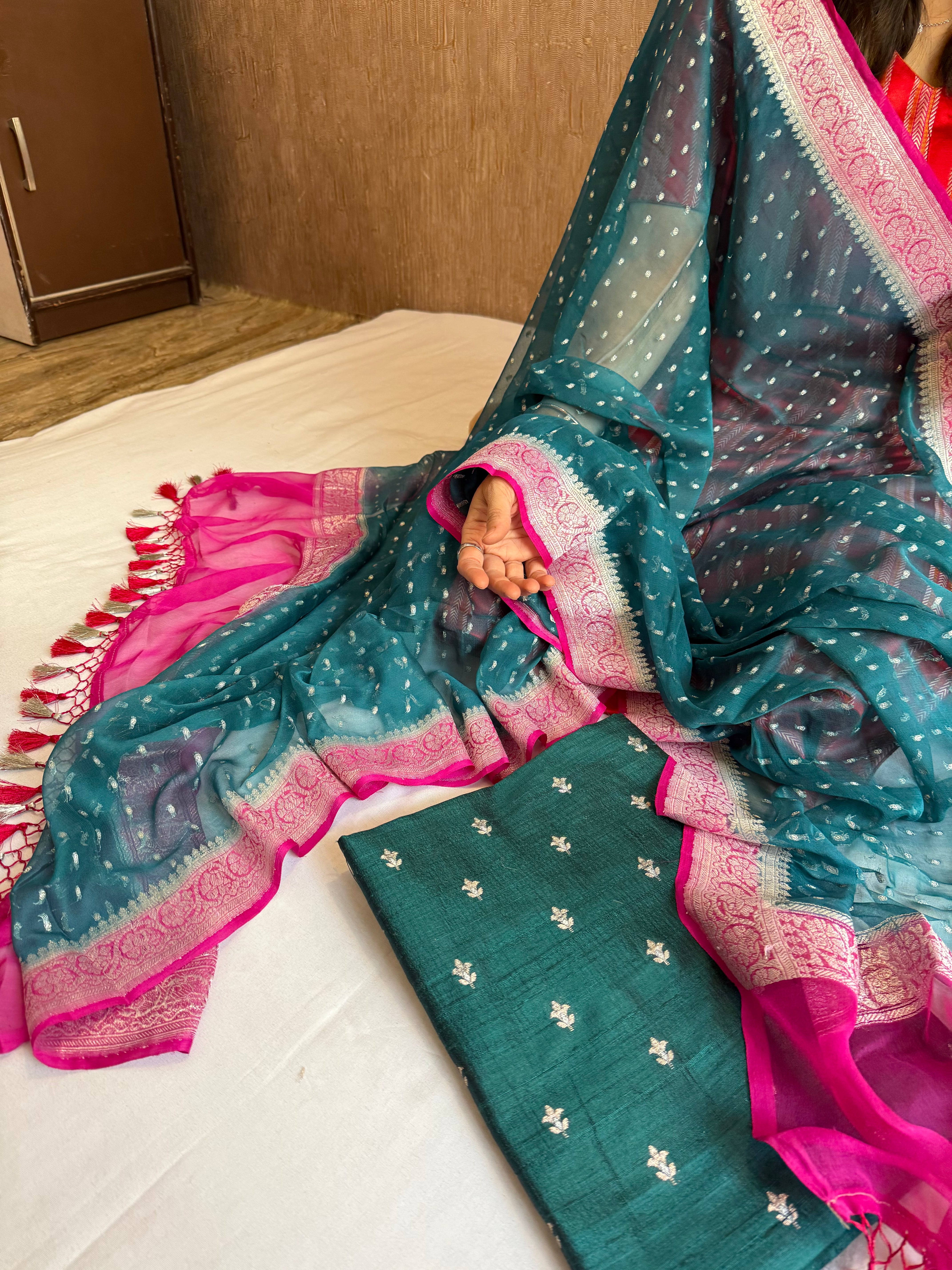 Emerald green-rani pink raw silk kadhwa buti kurta paired with chiffon gorgette chap dye duppata set