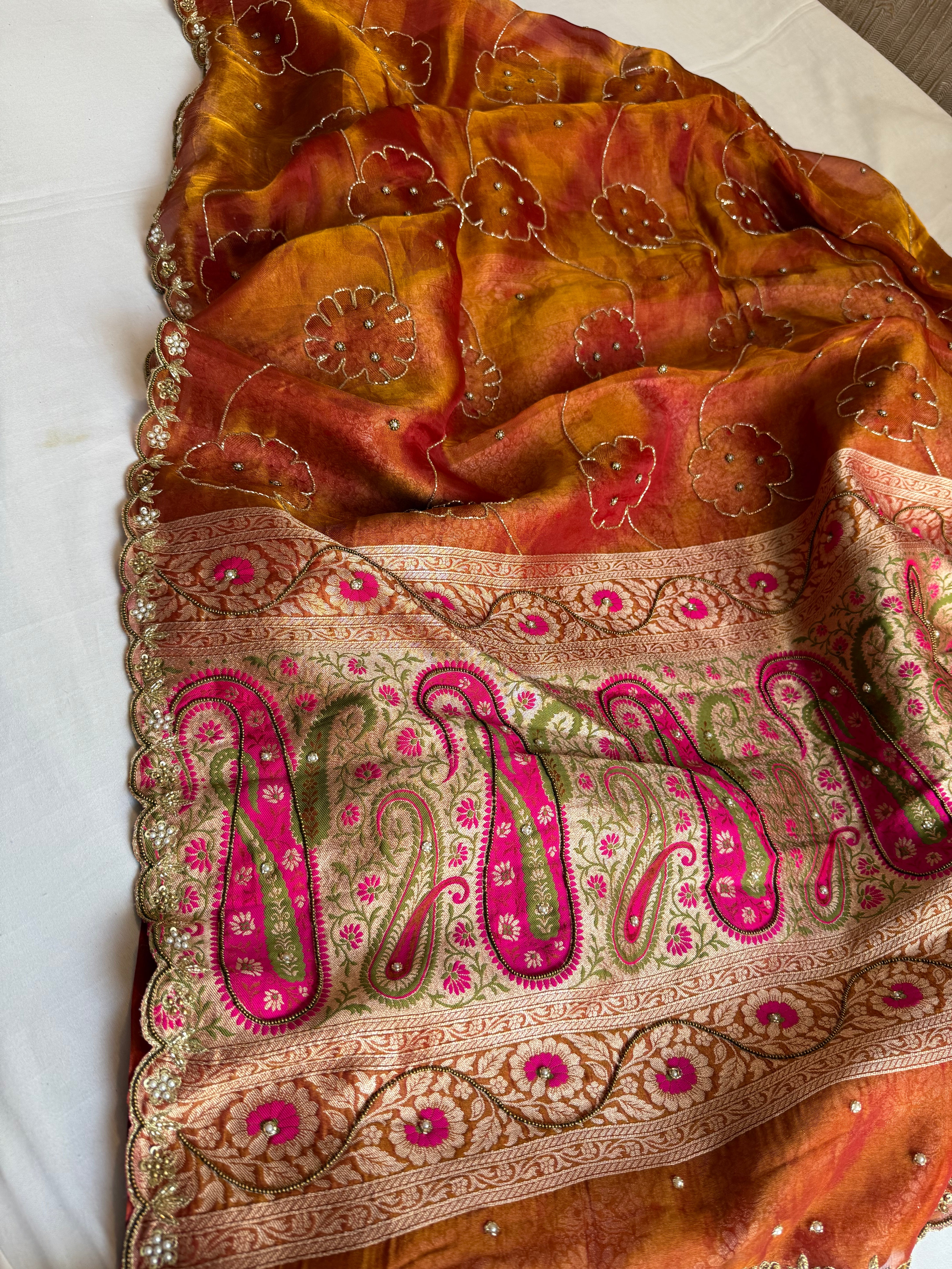 Rust orange tissue tanchoi jamevar pallu meenakari work hand embroidered saree