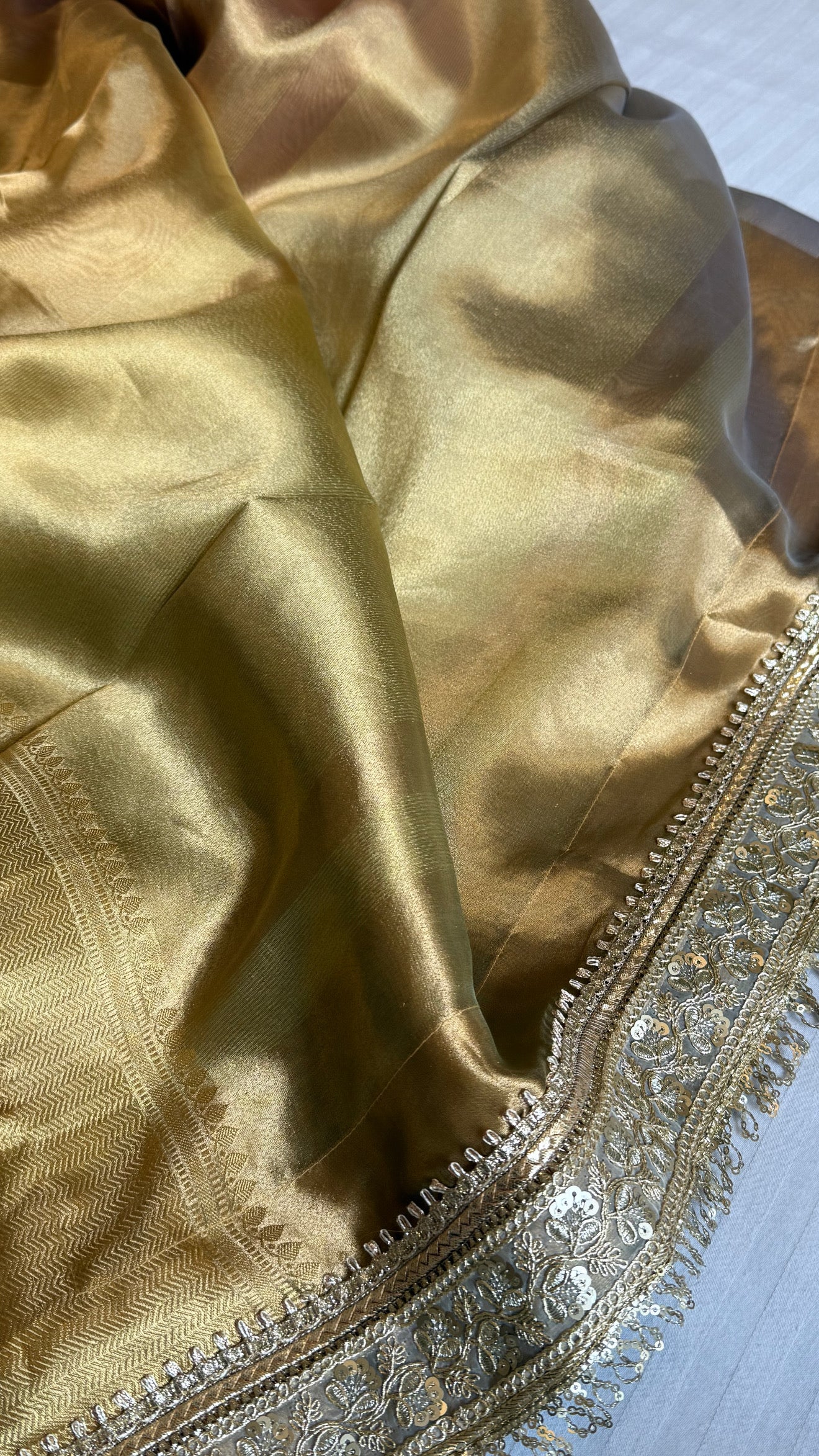 Earthy shades of rang birangi maharani tissue silk kadhwa saree