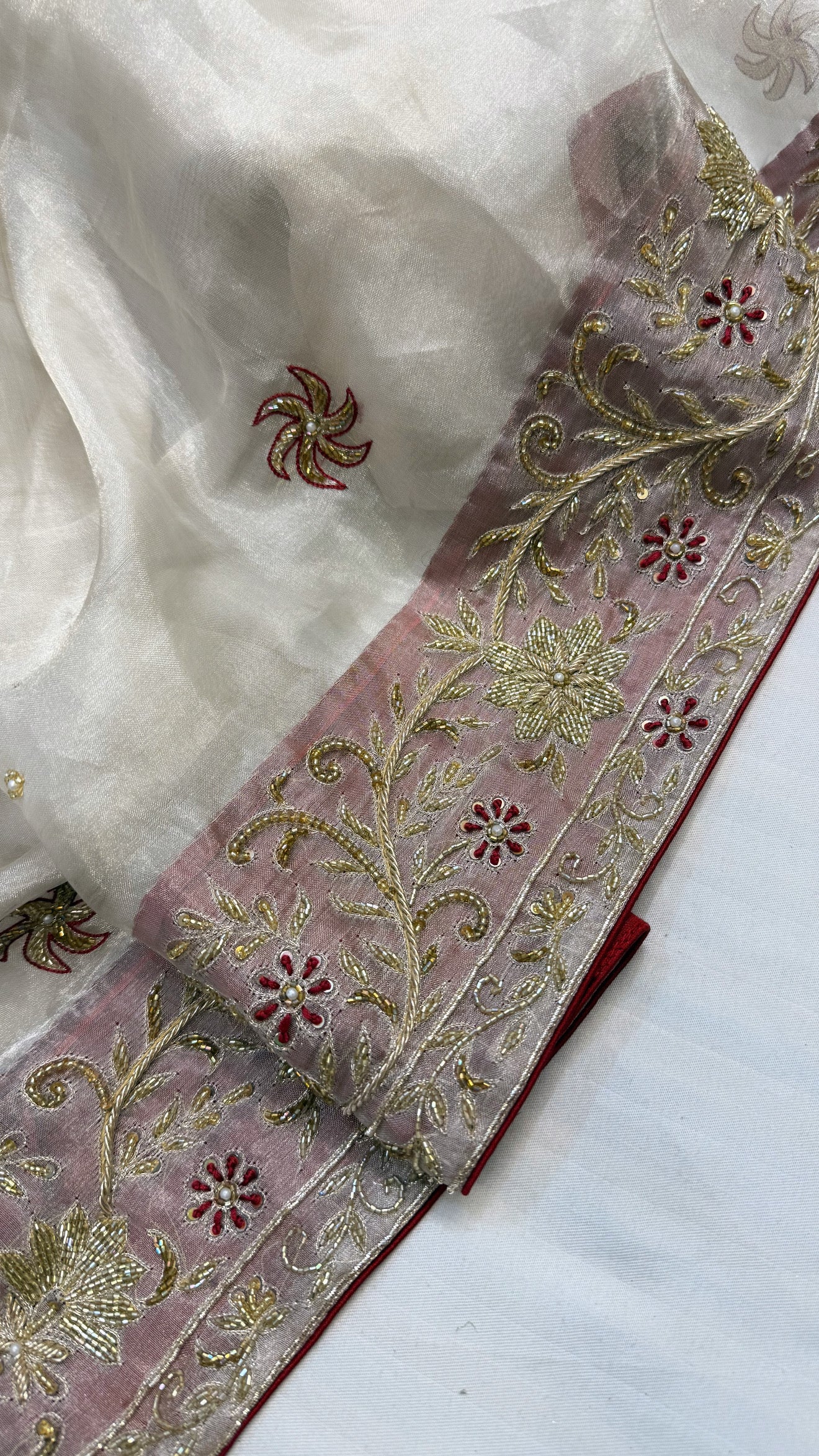 Gulab ki pankhuri husn tissue silk heavy hand embroidered zardozi border saree
