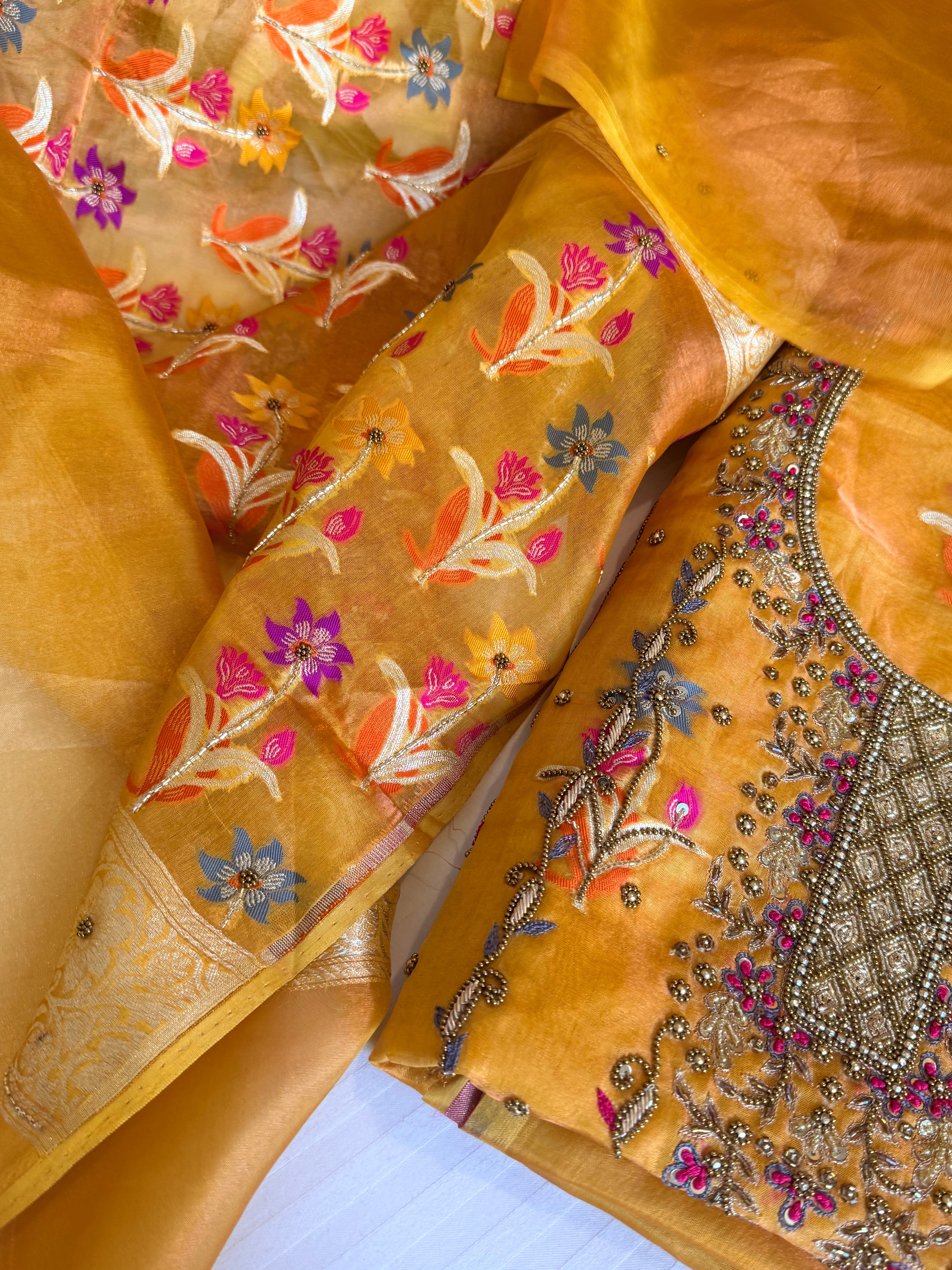 Banarasi tissue silk haldi gold tissue silk meenakari hand embroidered suit set