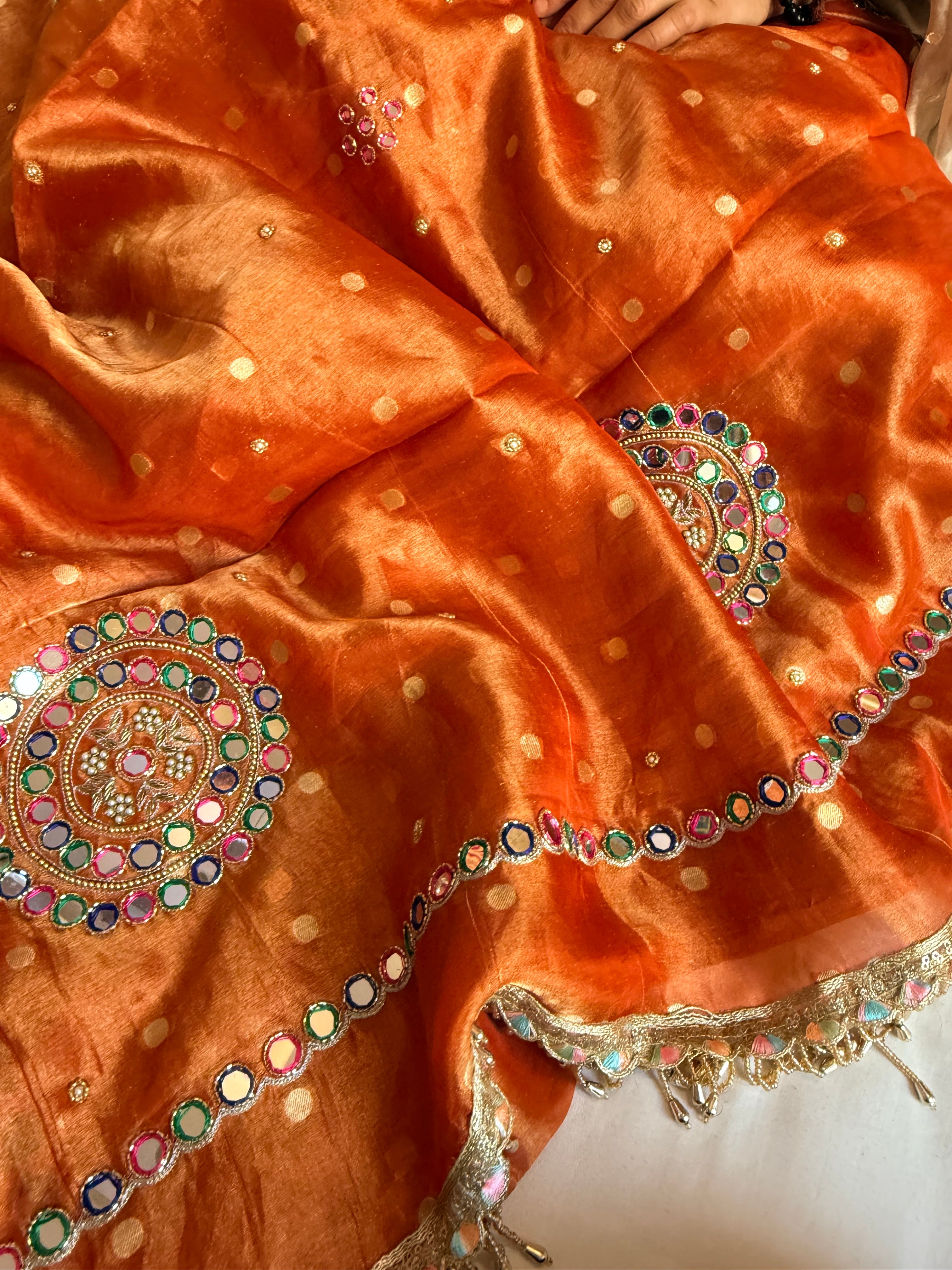 Fanta orange tissue silk meenakari mirror work hand embroidered saree
