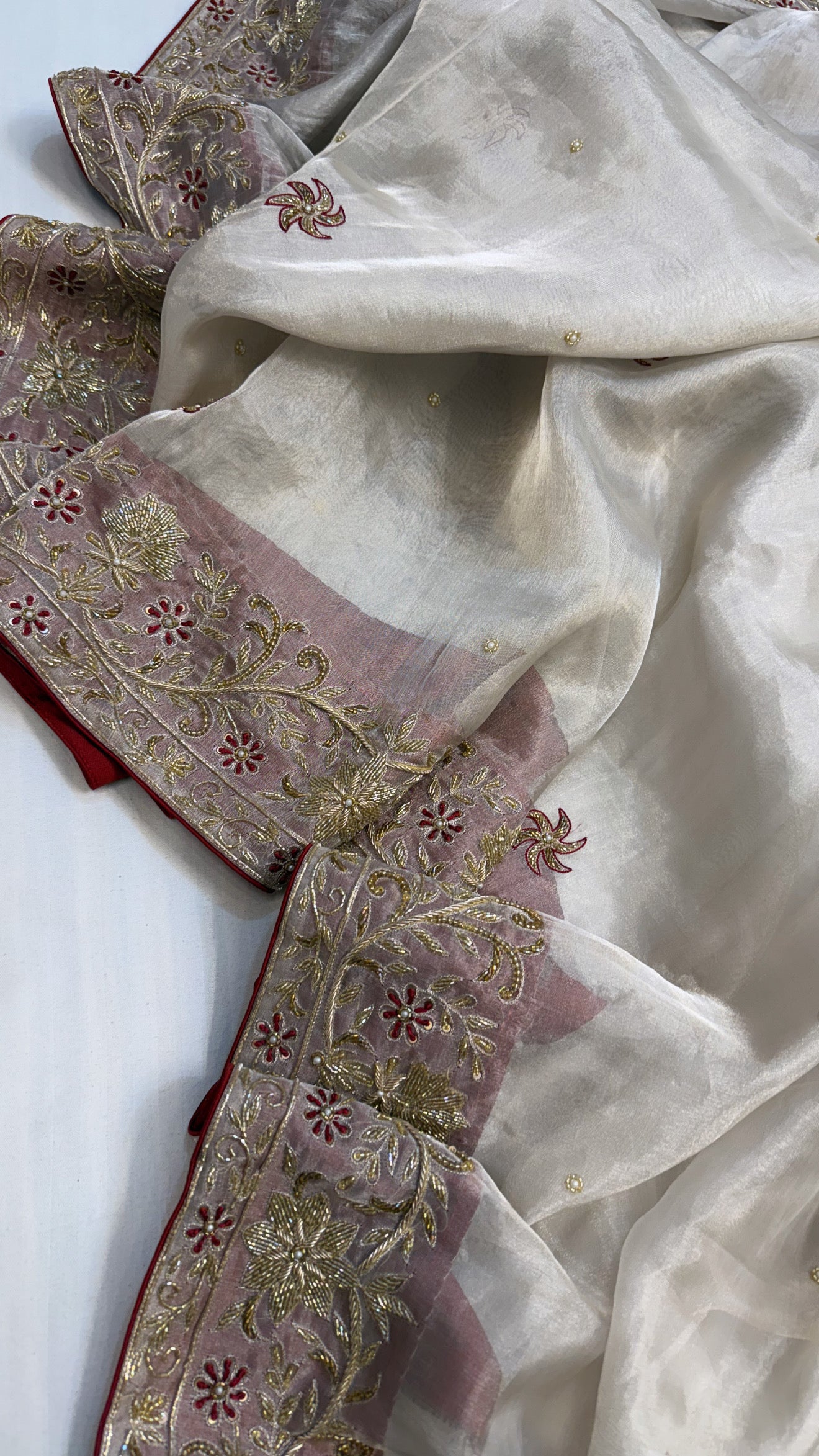 Gulab ki pankhuri husn tissue silk heavy hand embroidered zardozi border saree