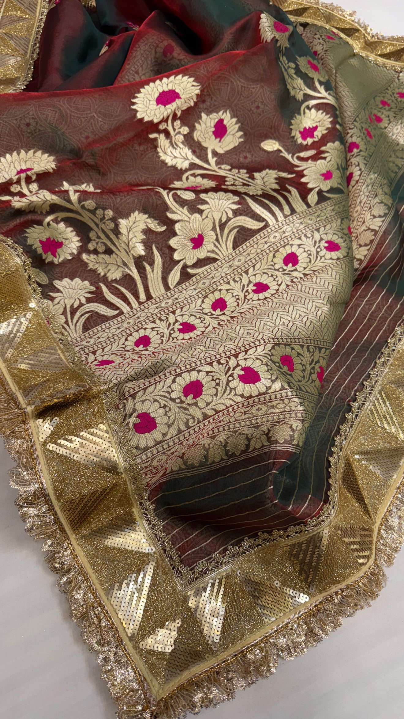 Maharani blood red dhup chao effect tissue silk meenakari saree