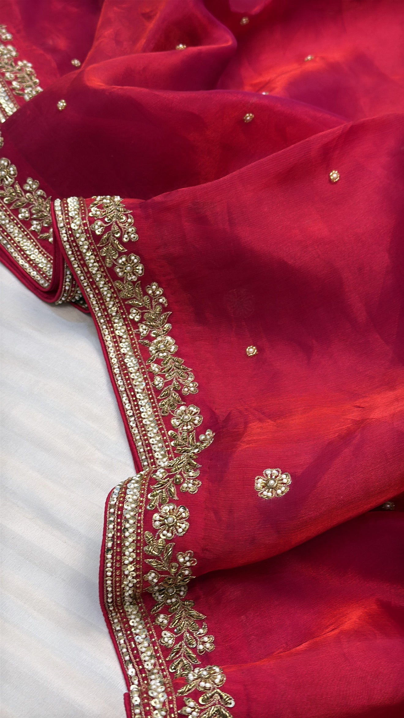 Dhup chao effect red rani tissue silk zardozi hand embroidered banarasi saree