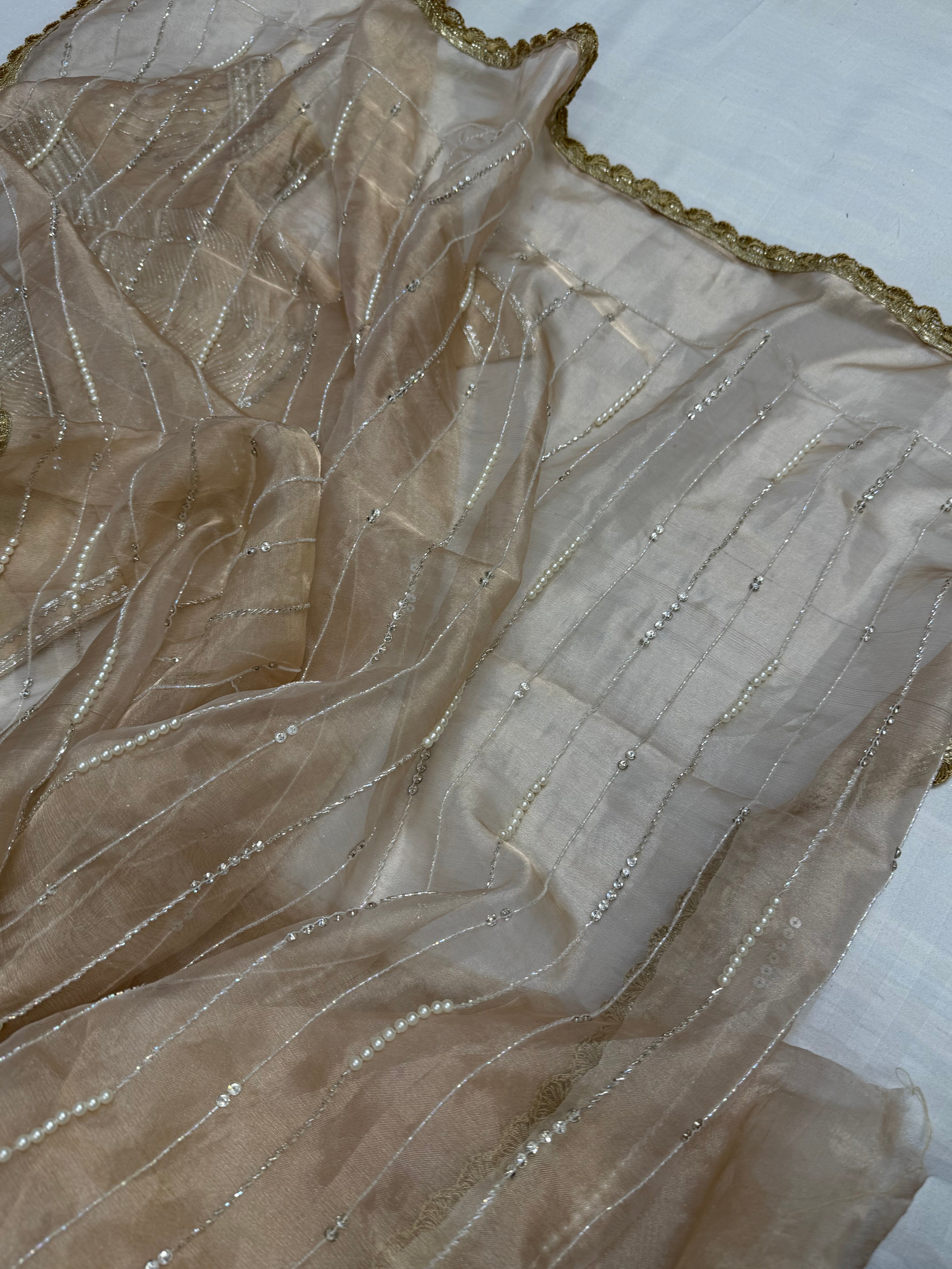 Suhana khan inspired golden pearl work heavy hand embroidered tissue silk saree