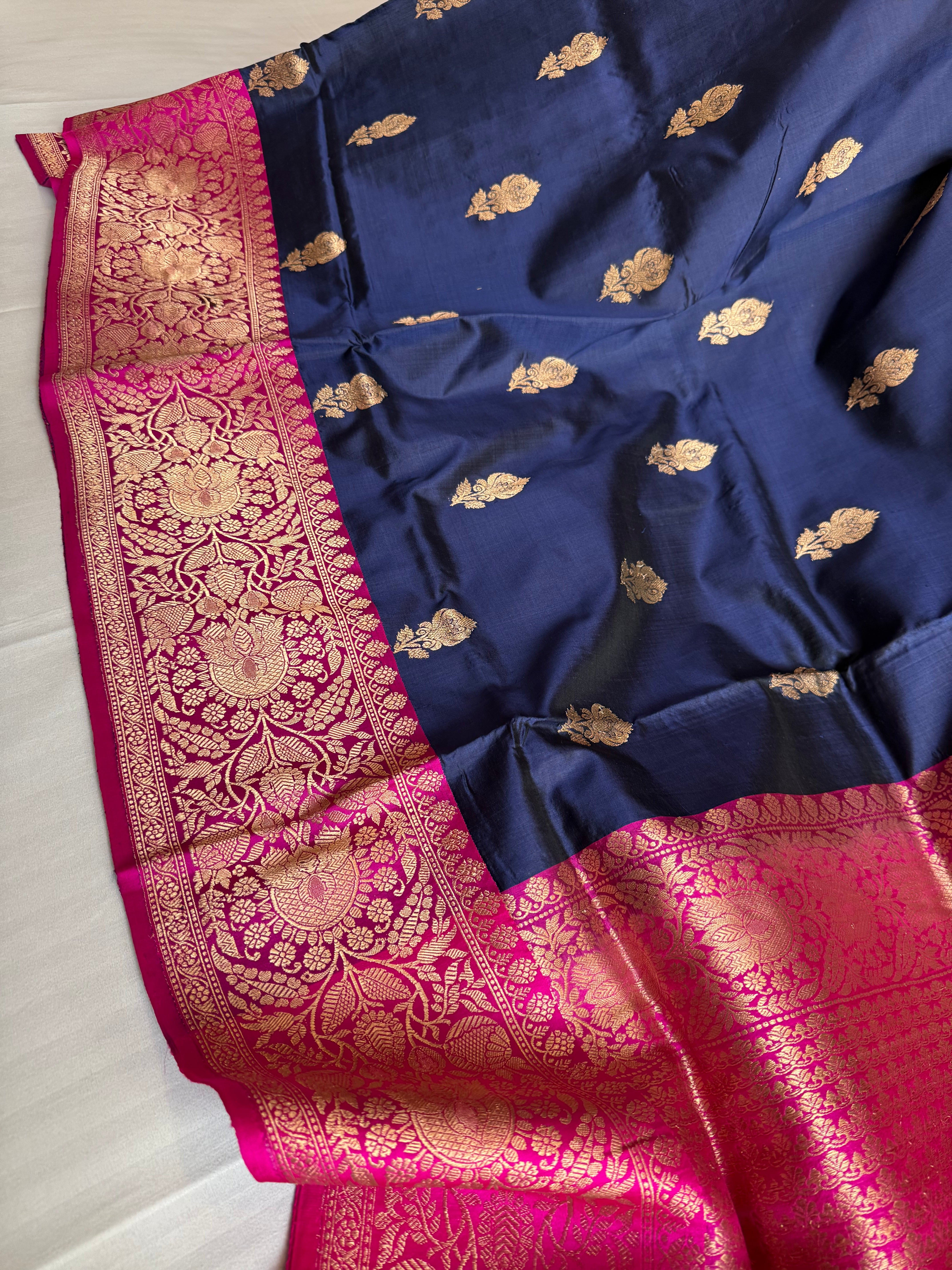 Navy blue-rani pink contrast combination katan silk kadhwa saree