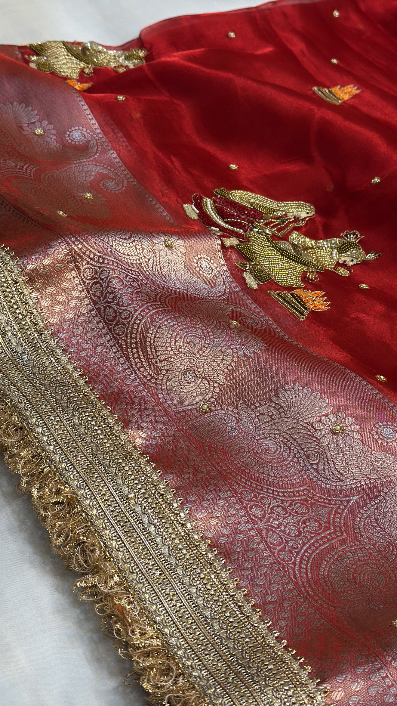 Dulhan ka joda husn red tissue silk hand embroidered saree