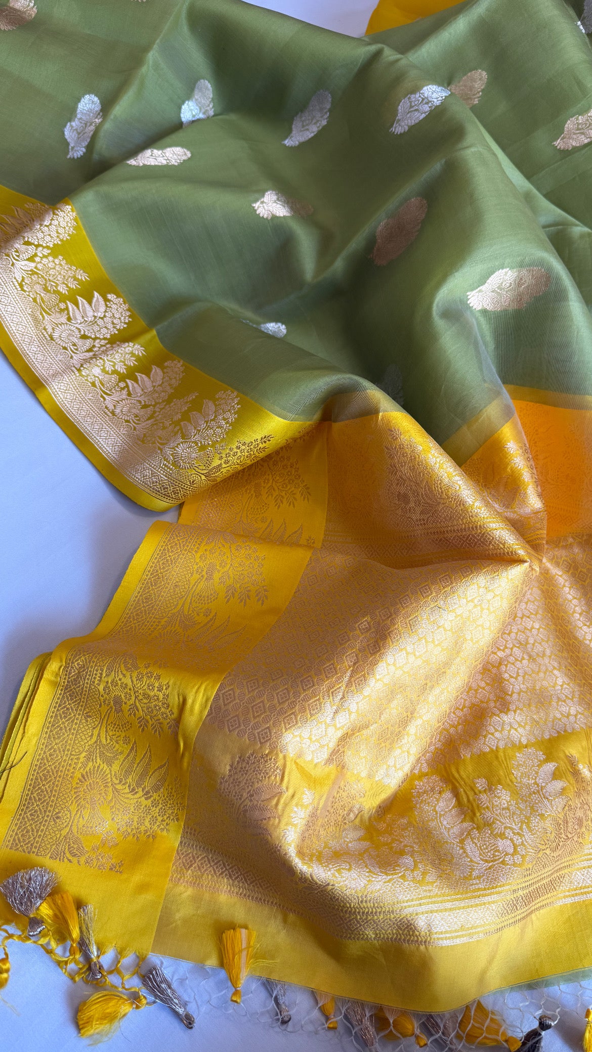 Parrot green-yellow kora silk banarasi border kadhwa saree