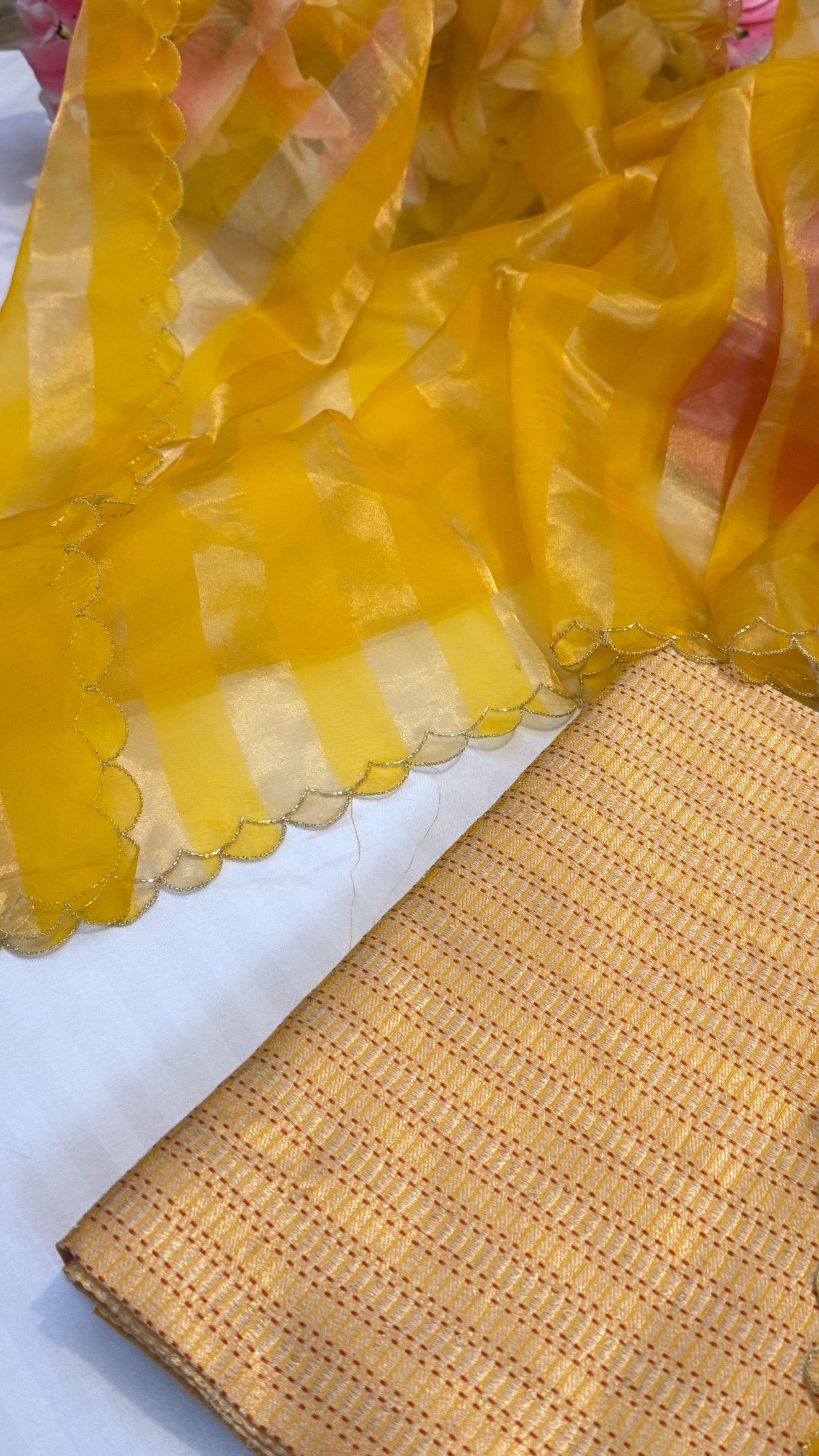 Haldi yellow katan silk brocade kurta paired with kora tissue scalloped striped duppata set