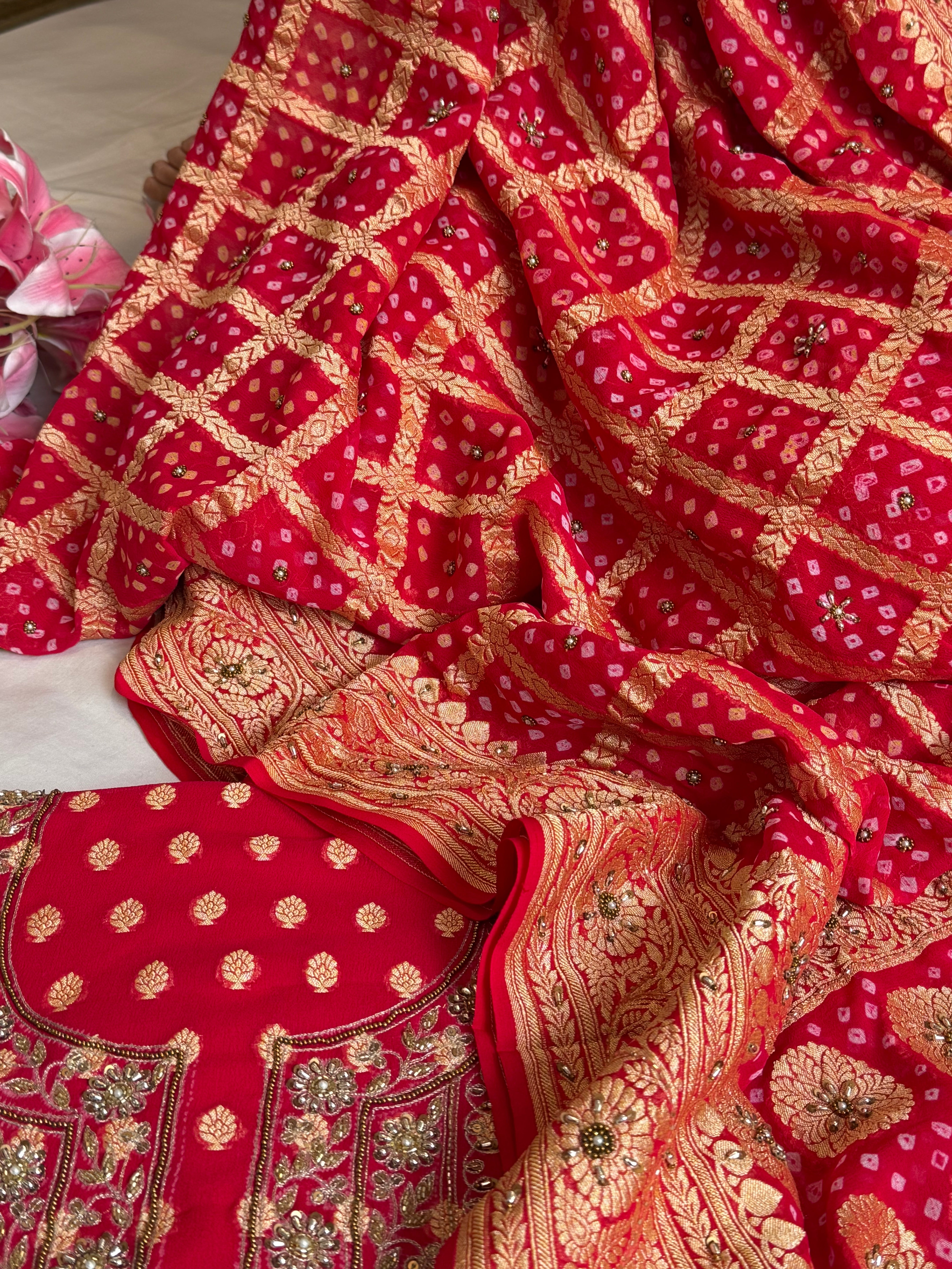 Red rai bandhej kadhwa gorgette hand embroidered suit set