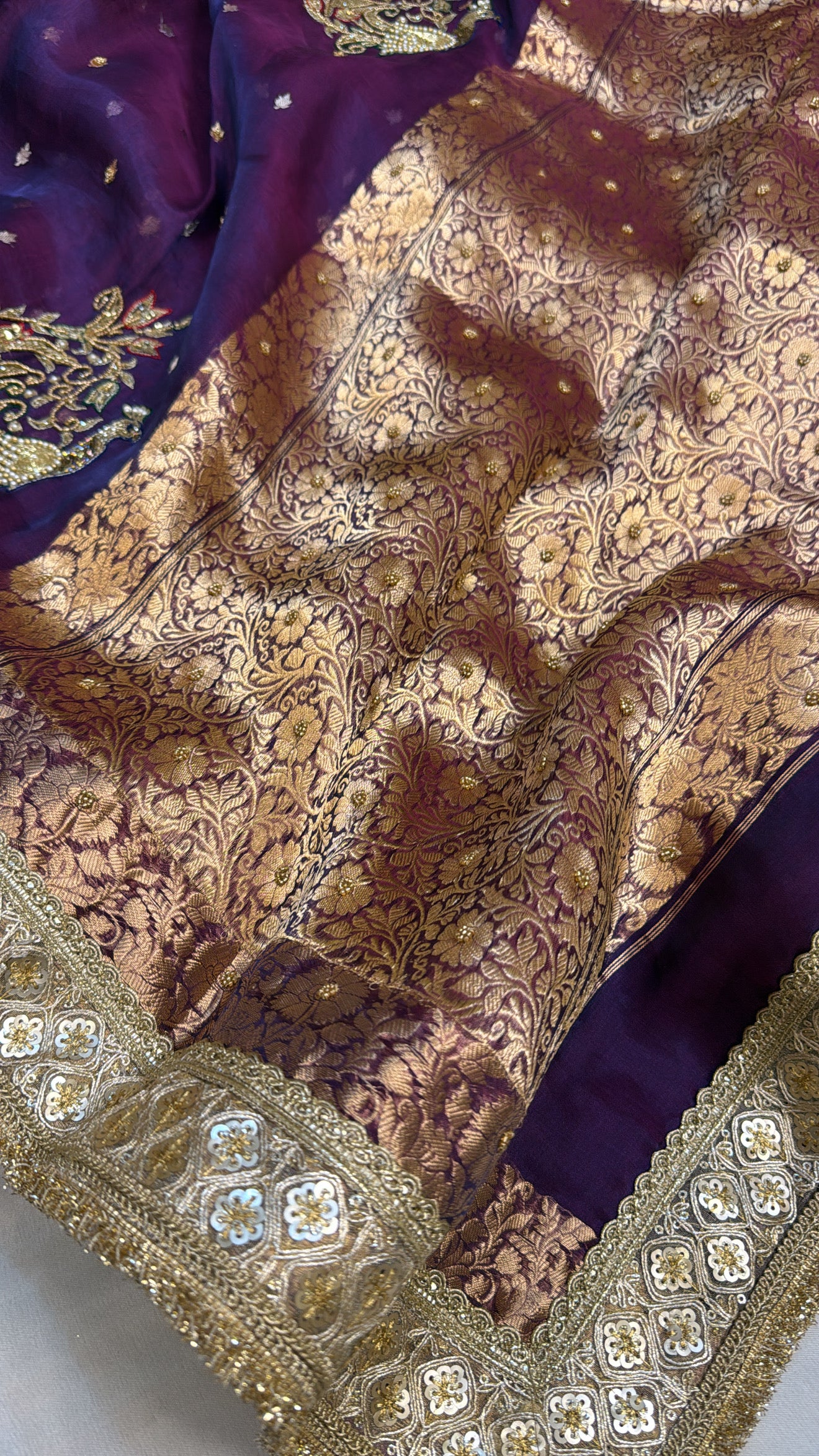 Husn peacock blue-purple dhup chao effect tissue silk hand embroidered saree