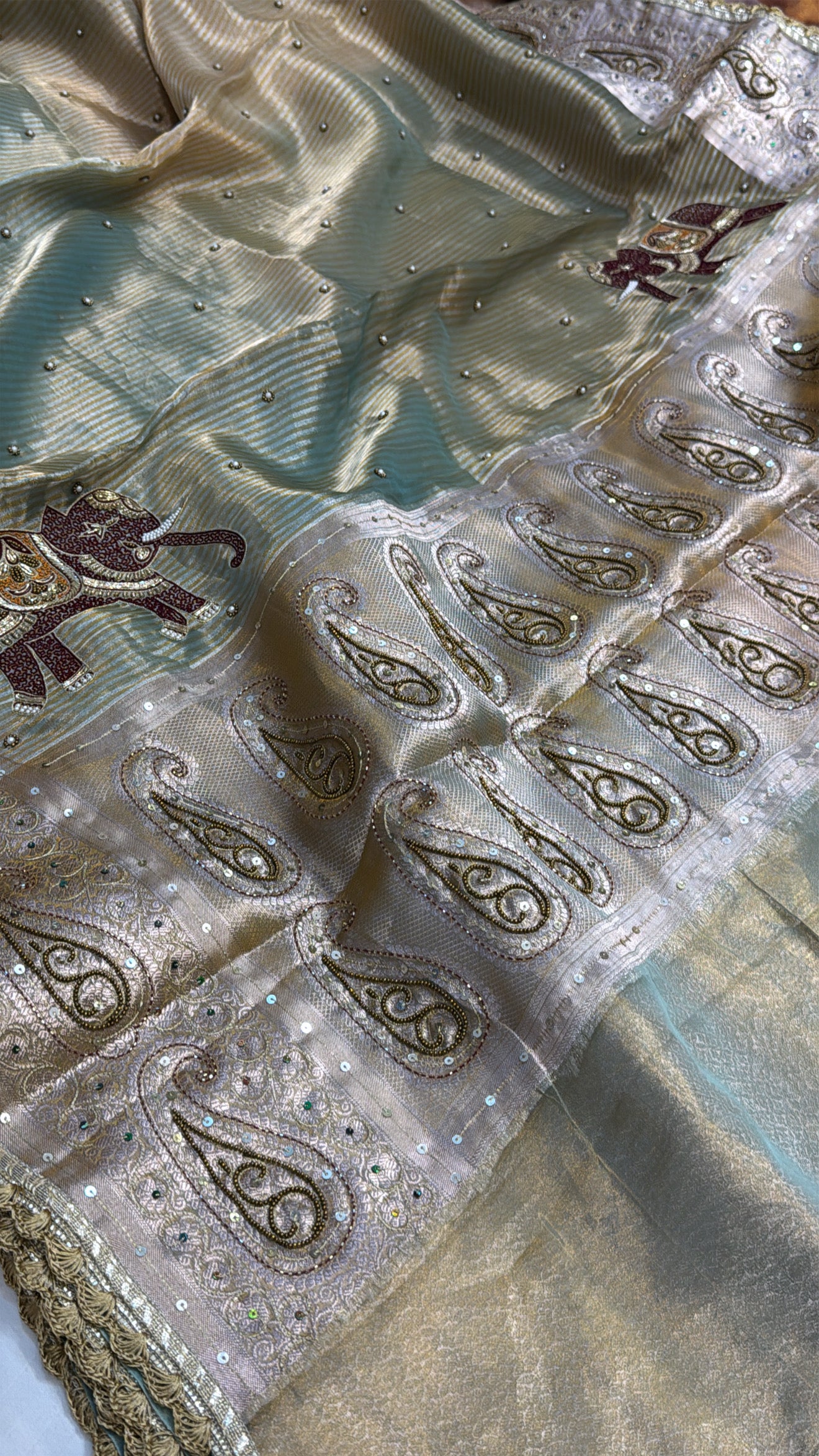 Molten gold-sage green tissue silk ombre shaded hand embroidered saree