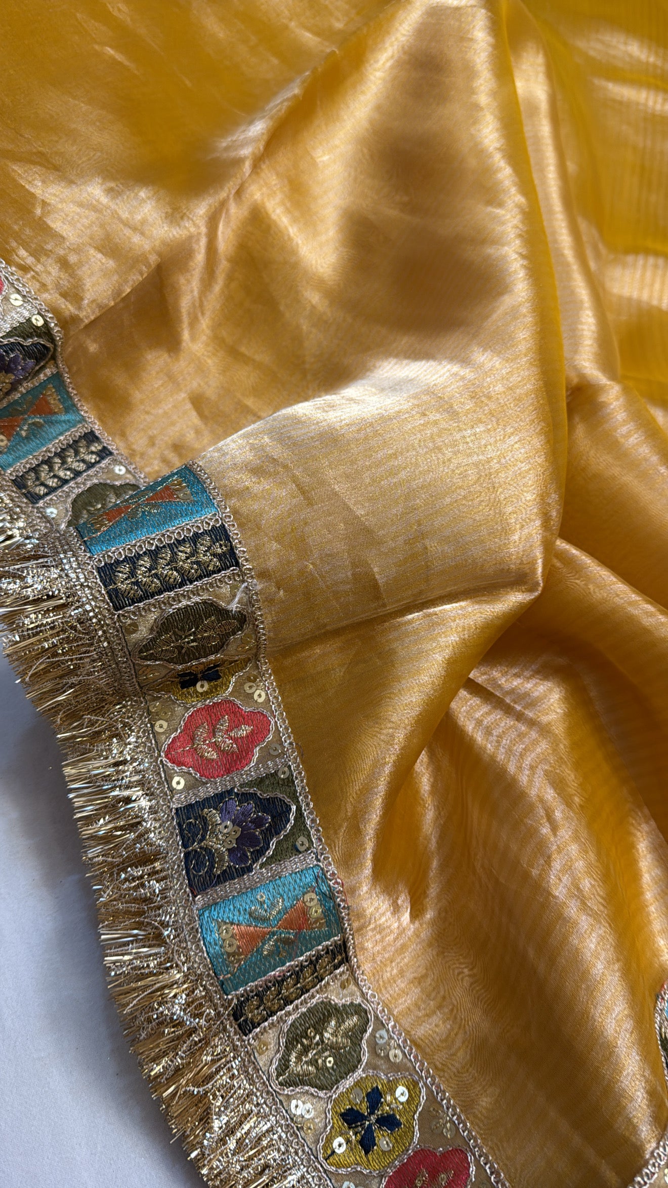 Haldi yellow tissue silk kadhwa meenakari border saree