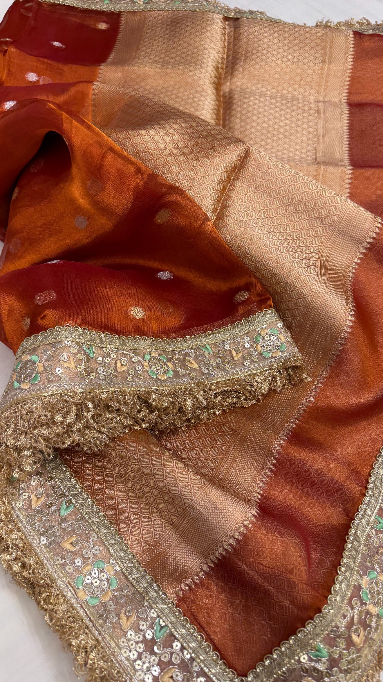 Maharani deep orange tissue silk kadhwa buti saree