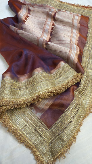 Maharani metallic maroonish-purple dhup chao effect tissue silk saree