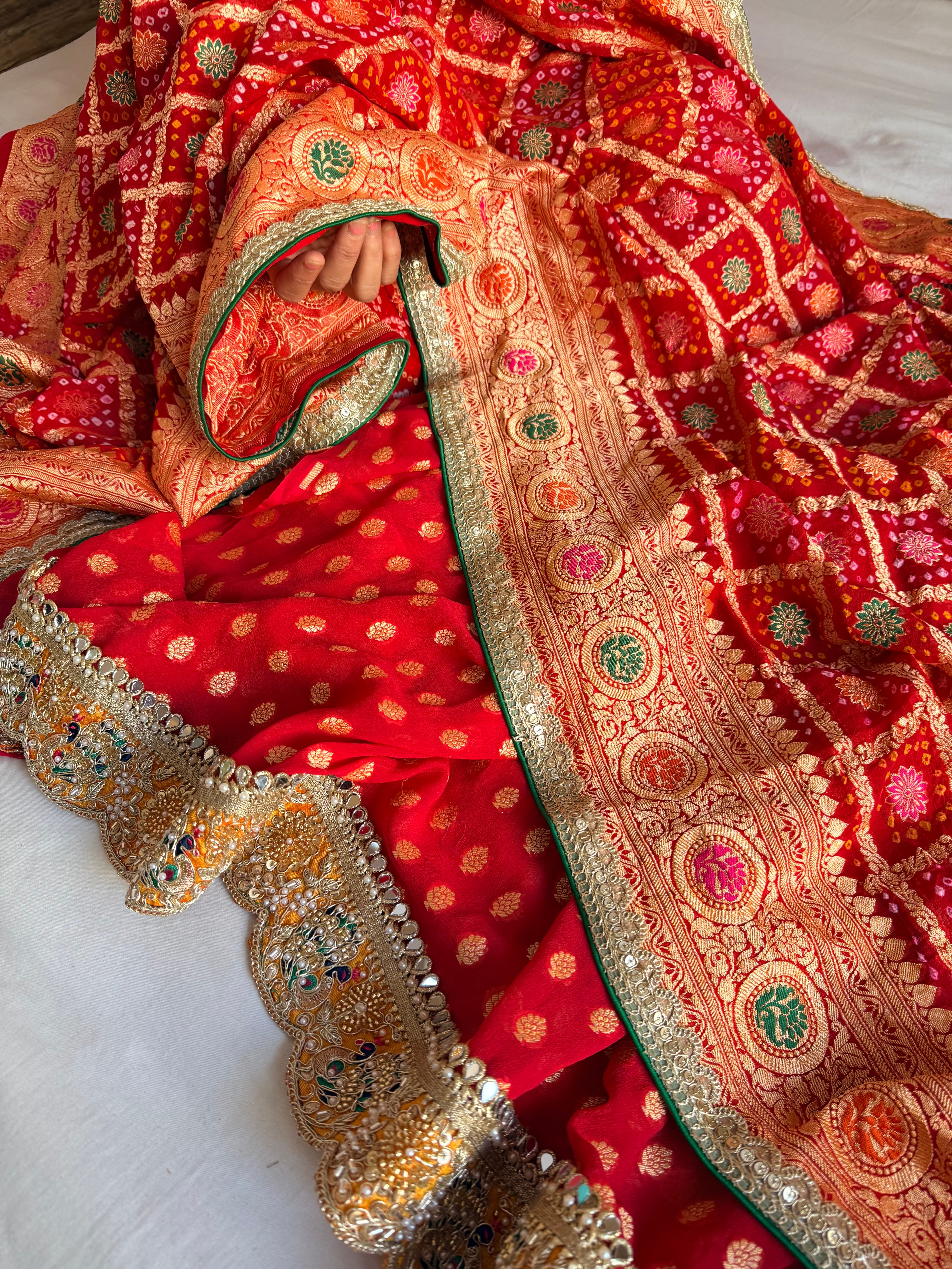 Rai bandhej red banarasi chiffon gorgette gotapatti suits