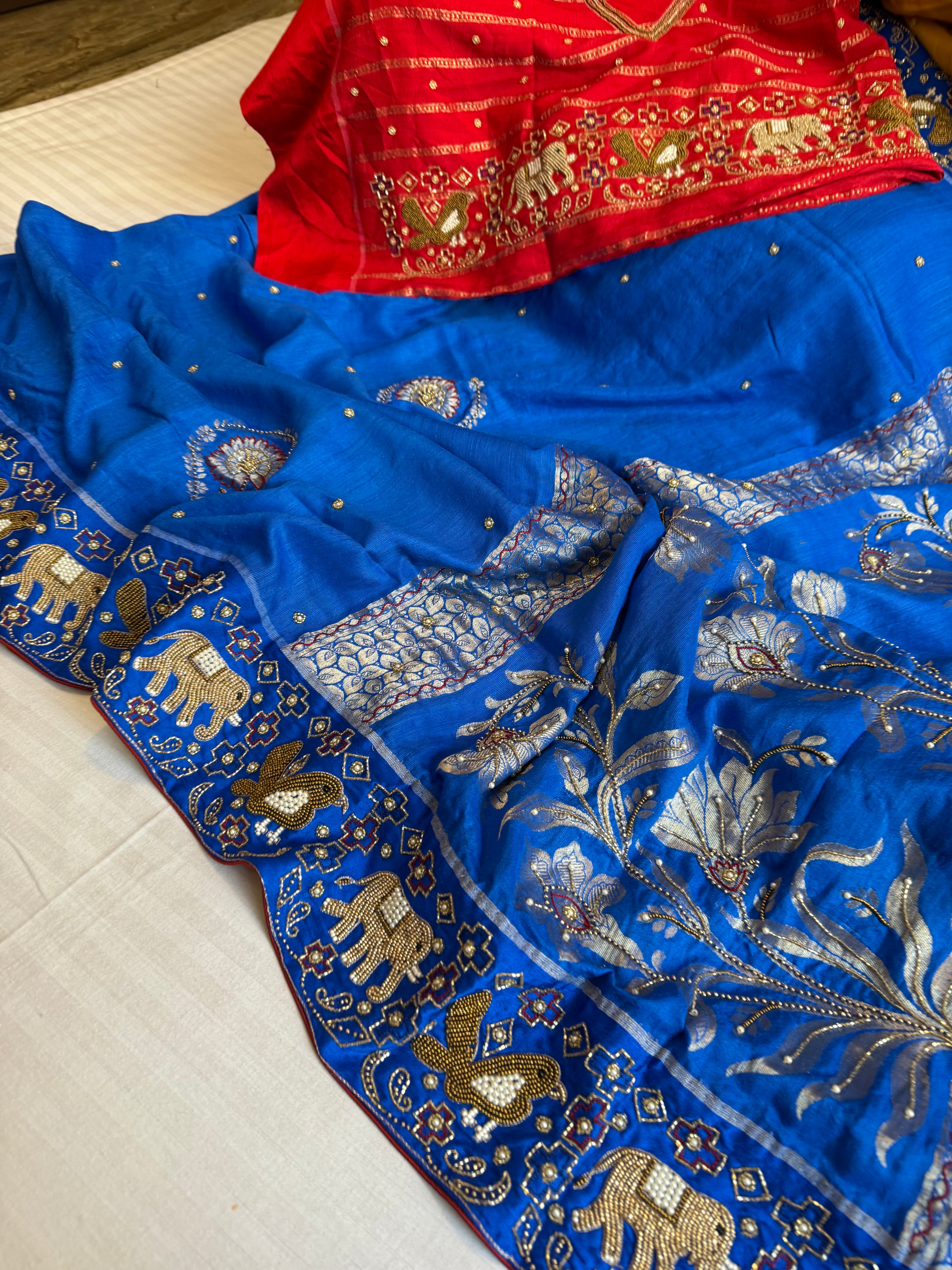 Moonga silk inspired ikkat patola inspired hand embroidered kadhwa saree