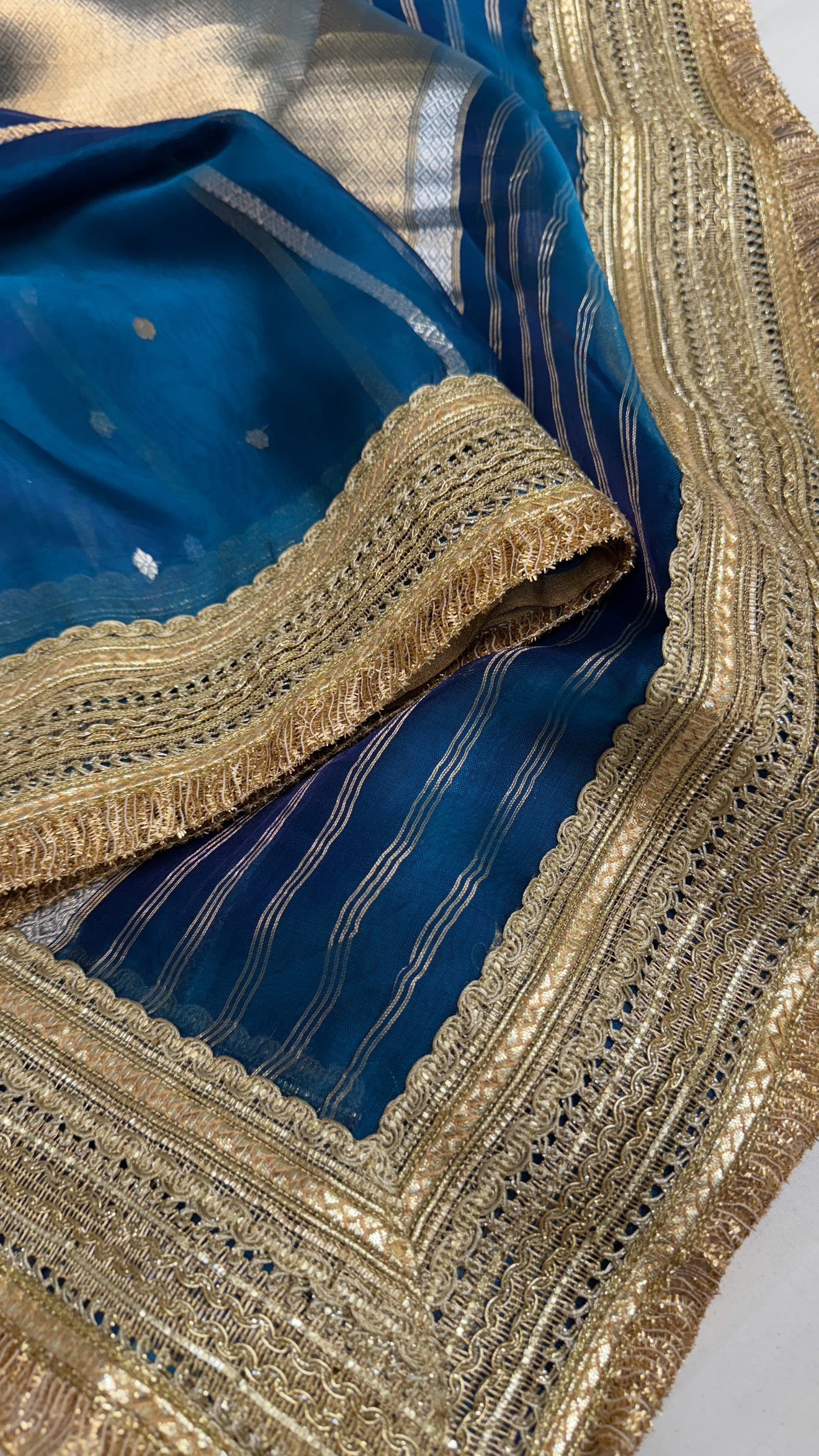 Maharani aqua blue tissue silk kadhwa buti saree