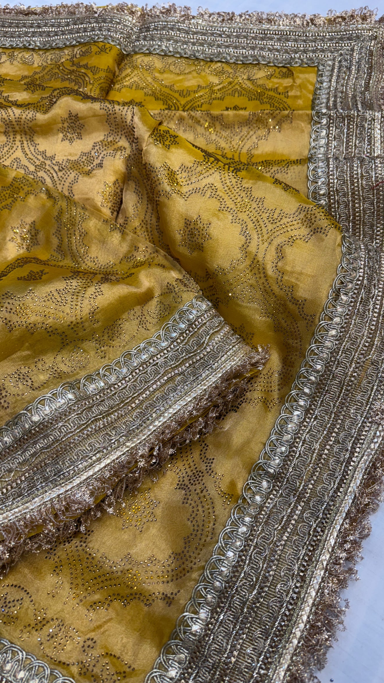 Sitara stonework haldi yellow tissue silk gotapatti saree