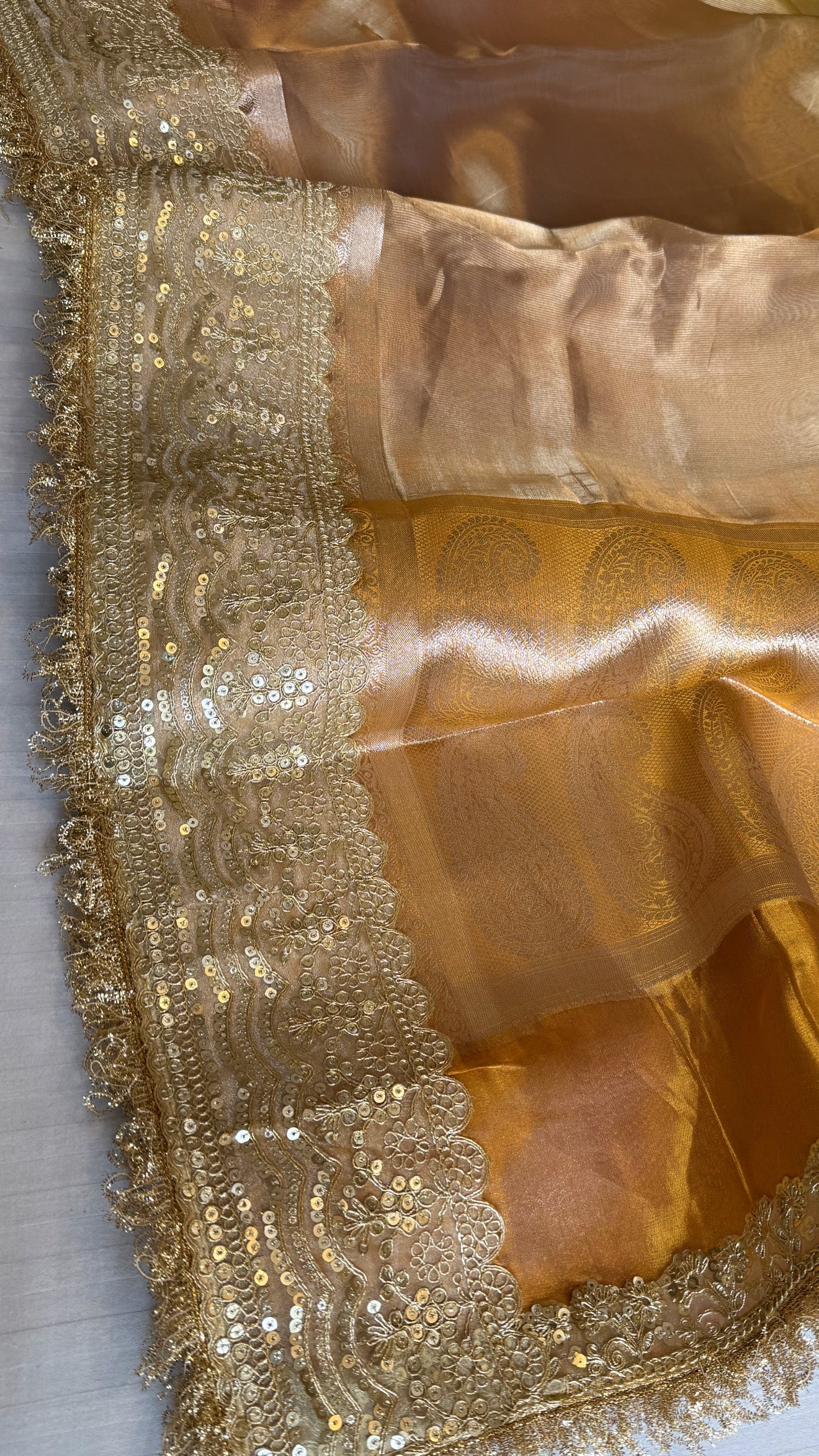 Earthy shades of rang birangi maharani tissue silk kadhwa saree
