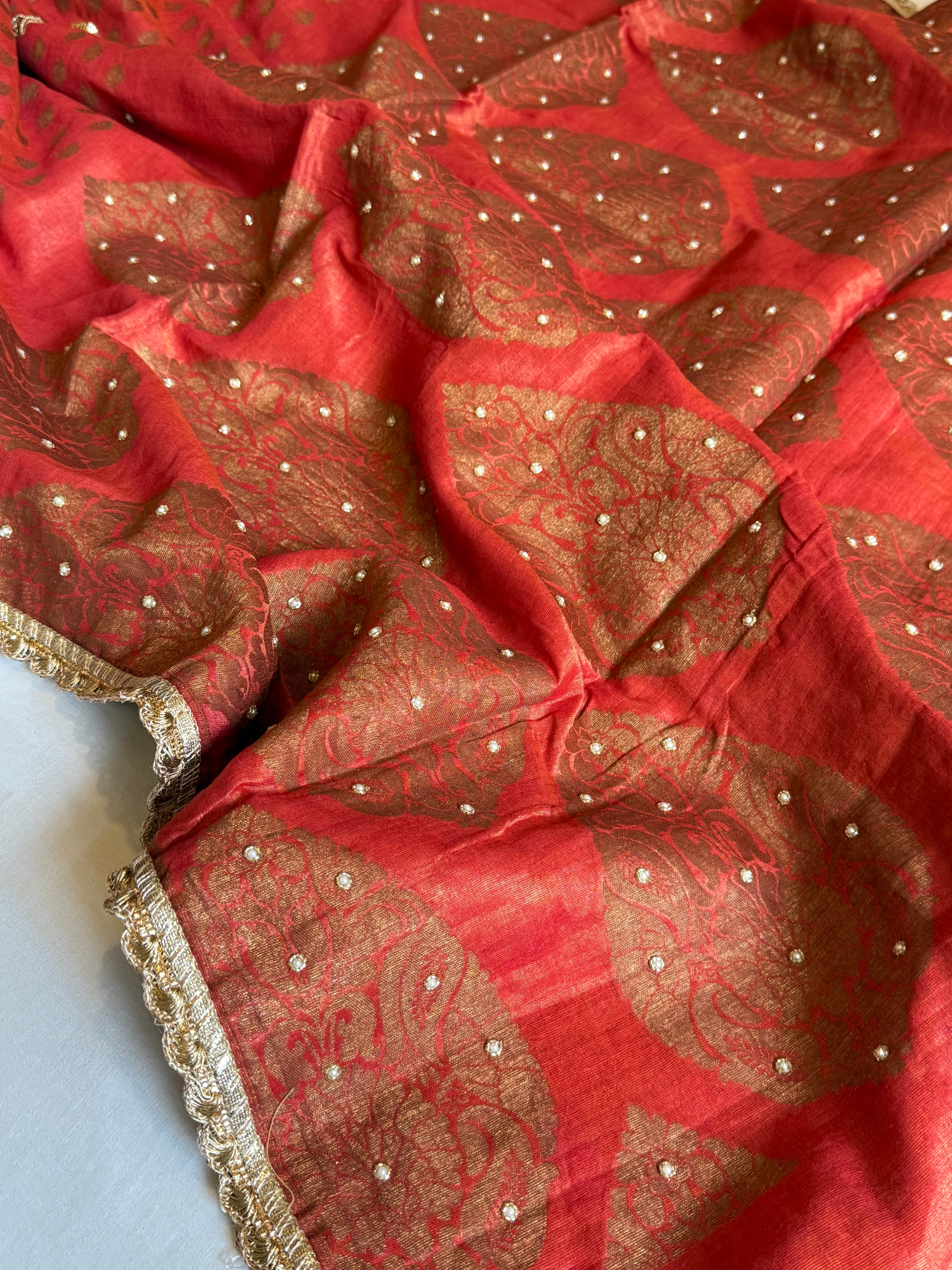 Chilly red tissue gorgette kadhwa antique zari hand embroidered saree