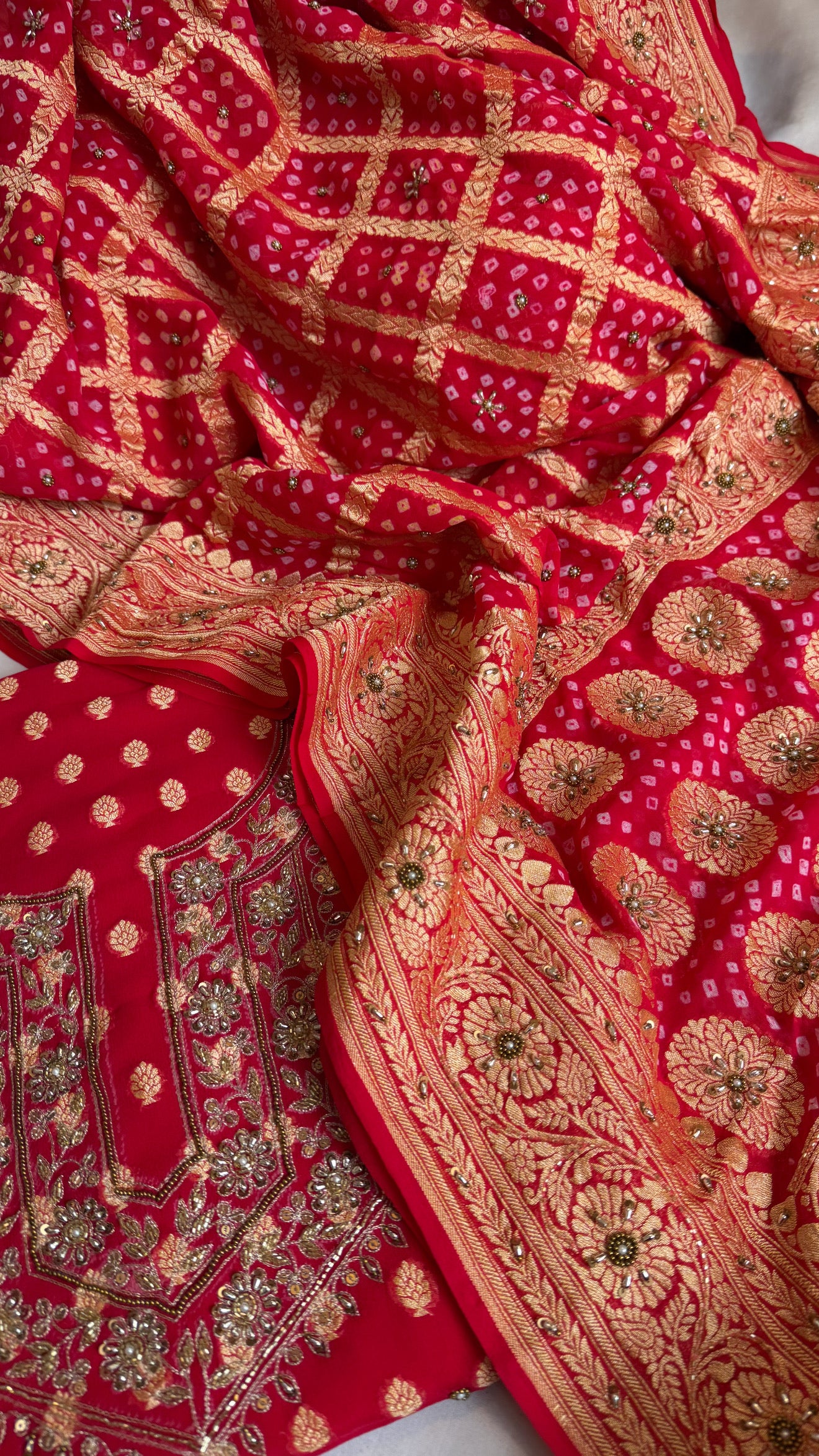 Red rai bandhej kadhwa gorgette hand embroidered suit set